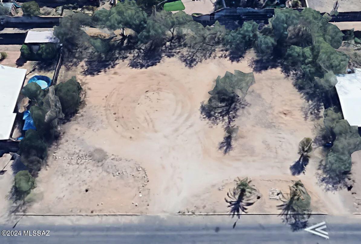 Builder or investor opportunity in Palo Verde Neighborhood, where .52 acre vacant lot with mountain views are rarely found. This  neighborhood is centrally located and close to the University of Arizona and Banner Medical Center. Build a large dream home or divide the lot into three. The lot comes complete with a survey and legal descriptions for splits. Flat Lot is cleared and some utilities are already in place. Your next central Tucson project is here. Owner/agent