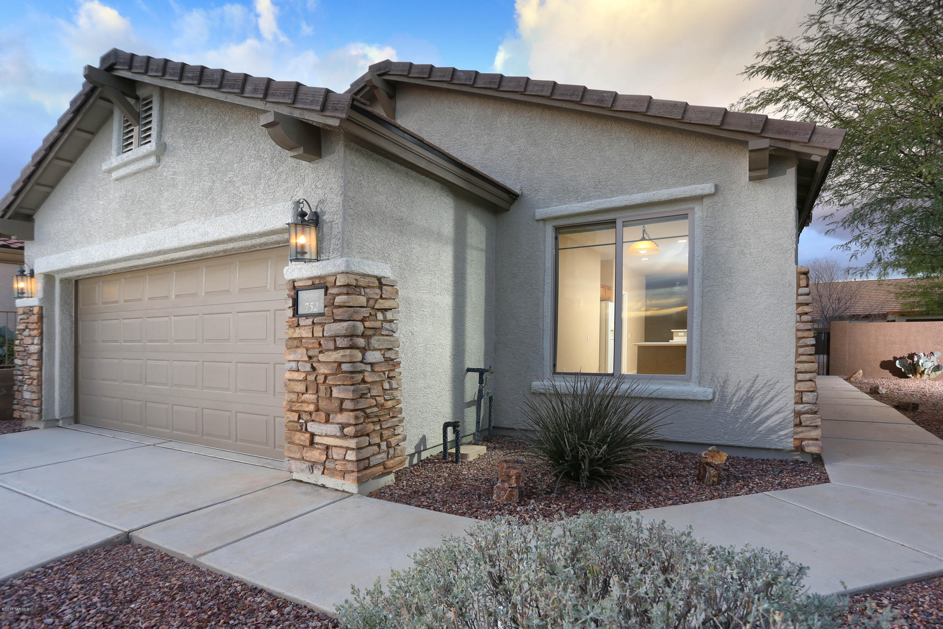 Sellers will accept offers and counteroffers between 145K and 162K for a fabulous 3bd/2ba home on a large corner lot in the  Sonora Del Webb Community. The home features 18 inch diagonal tile flooring throughout, a large living room with breathtaking panoramic mountain views to the northeast, a kitchen with custom counter tops and a dining area with views of the Santa Rita Mountains. Master suite features a large walk- in closet and double sinks in the master bathroom.  Second full bedroom and full bathroom works great for guests; third bedroom features custom-made cabinetry and works well as an office or a guest bedroom. Extended backyard has no adjacent lots on the east and south side.  Sellers warranty included! This home is perfect for active adults or snowbirds--an absolute must see!!