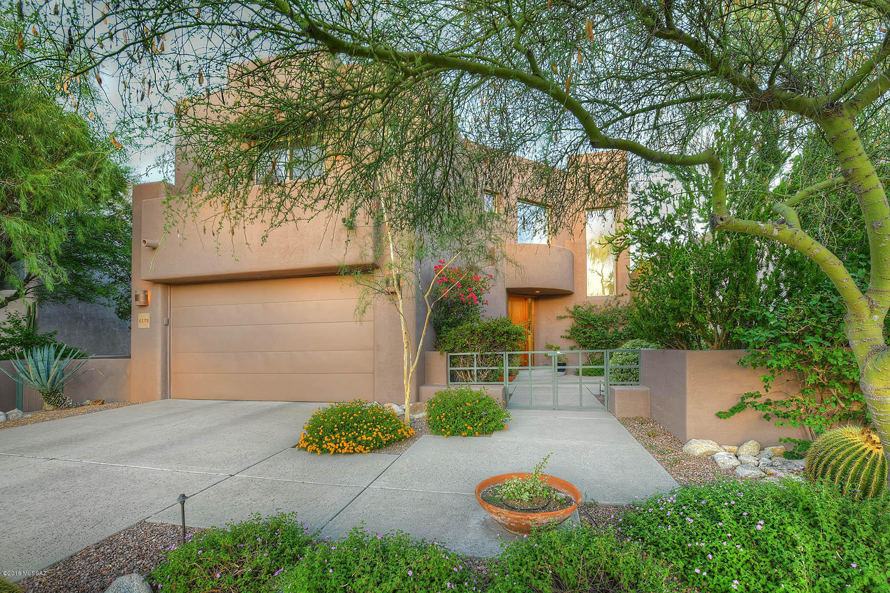 Lock & Go Luxury in This 3BR/3BA Home On The Ventana Canyon Golf Course. High on The Ridge w/Stellar Mountain Views! This Masonry Home Features a Charming Courtyard Entrance, Granite Kitchen w/ Stainless Appliances, Great Room w/ Vaulted Ceilings & Gas Fireplace, Open and Airy Den/Office, Master Bed with Huge Mountain Views and Balcony Overlooking the Golf Course. Guest Rooms with Mountain Views and one includes a  Balcony Overlooking the Lake w/Waterfall.  2 Car Garage. The Oversized, Private, Oasis-Like Backyard Features Amazing Mountain Views, Large Covered Patio and Plenty of Room For Entertaining!! Located on a Quiet Cul-de-Sac Adjacent to Golf Course Lake & Waterfall. Immaculately Maintained and Very Lightly Lived in by this Original Owner.