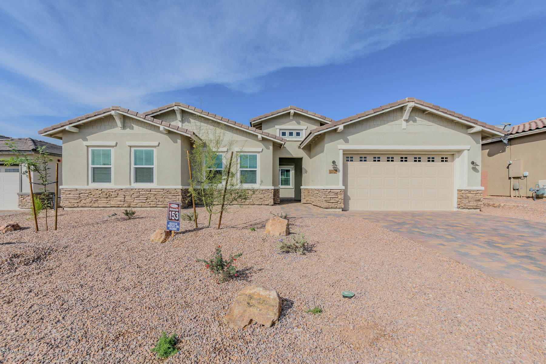 MOVE-IN READY!! Craftsman-style Tortolita floorplan with separate teen retreat, large eat-in kitchen w/upgraded cabinets, granite counters, stainless steel gourmet appliances, walk-in pantry, breakfast bar and servery. Master retreat features private hall, huge walk-in closet, walk-in shower with spa niche & dual sinks. Other upgrades include: two-tone paint, recessed lighting, ceiling fan outlet at back patio, gas BBQ stub-out & more!