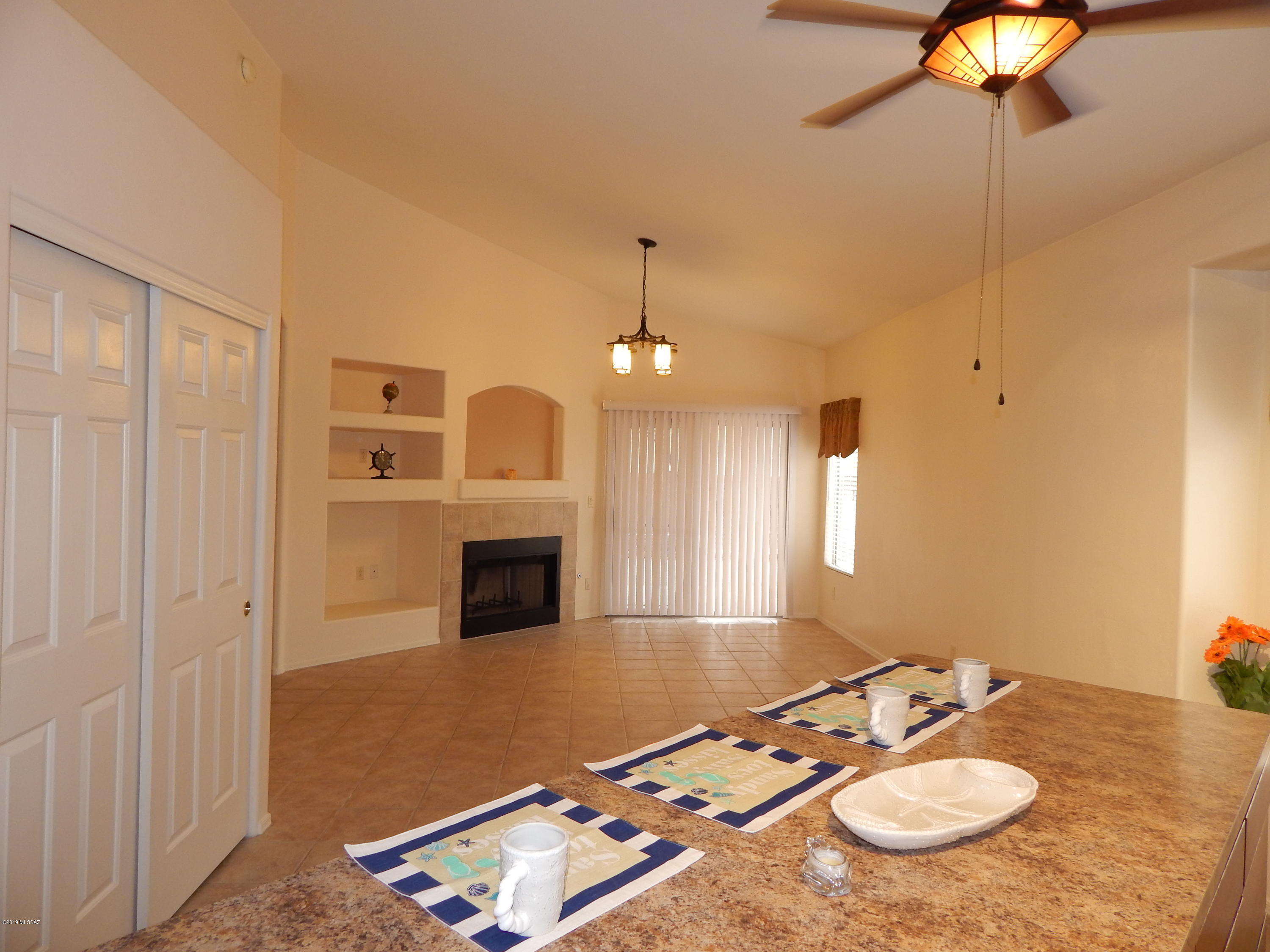 Beautiful home in Gated Rancho Agua Dulce! Open and Invitiing with soaring ceilings and a beautiful wood burning fireplace in the family room. Formal living and dining room plus a great room complete with wood burning fireplace. Large Kitchen has a HUGE island with lots of power to it. Island cabinets features pull out drawers and roll out shelves in cabinet. Upgraded lighting in this home. 4 bedrooms split - two off living area and one PLUS large master off great room, Hall bath has two entrances kind of like Jack N Jill. Laundry room is complete with washer and dryer and lots of storage cabinets in there. Two car garage is very nice with one wall of storage cabinets. Garage door is insulated! New Hot water heater Nov 2019. Enter the backyard to a stunning and serene garden setting, Near