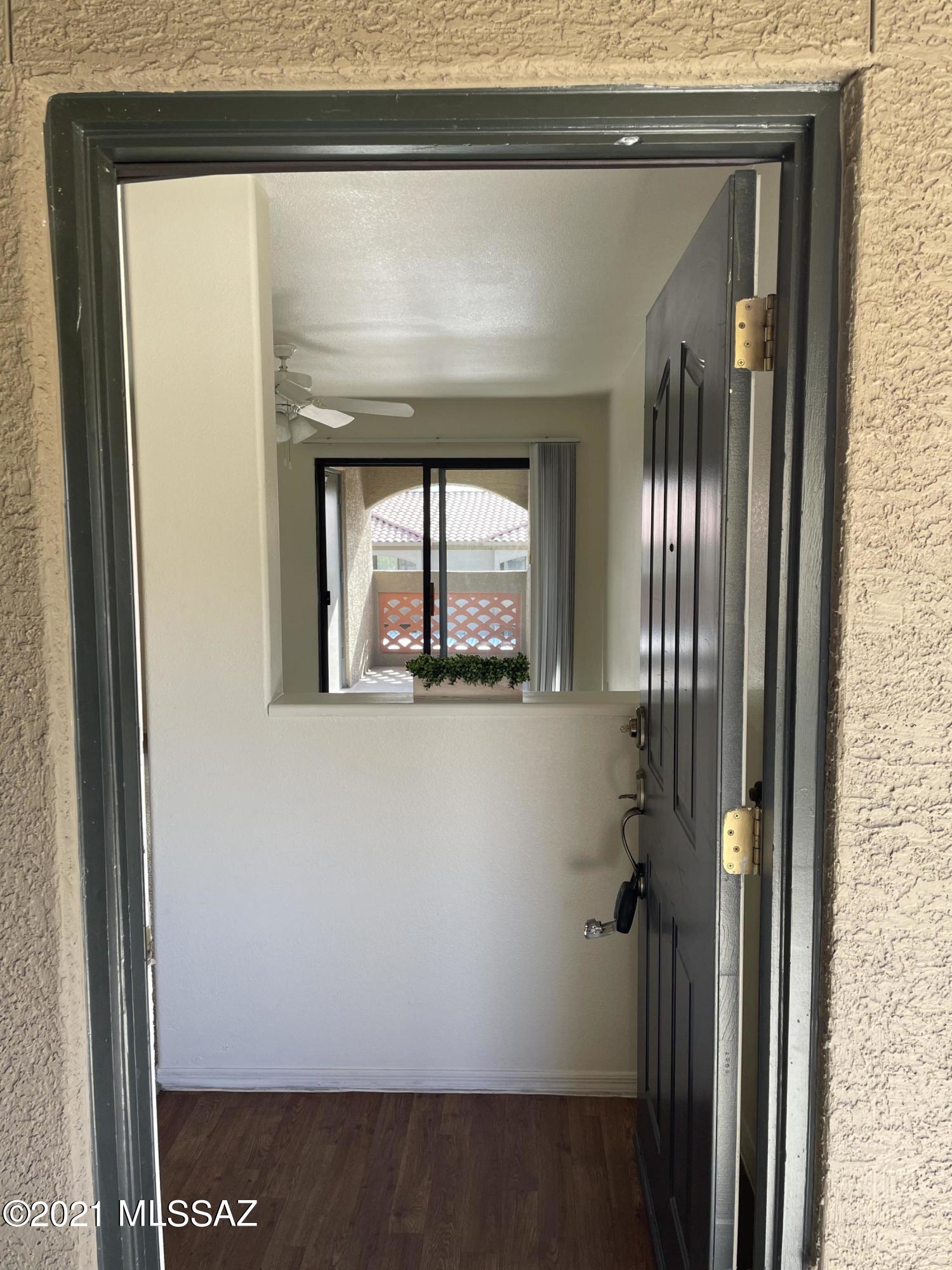 Extremely private second level corner unit with mountain views located in one of the most desirable condo communities in Tucson. Veranda at Ventana is a 24 hour gated access community including 2 resort style pools and fitness center located in the prestigious Ventana Canyon area surrounded by close up choice mountain views. Upon entering the unit, you have a defined entry space with a partition wall looking in to a spacious great room. Kitchen features plenty of cabinet space, a breakfast bar and a walk in pantry. Owner's suite includes large walk in closet. Between the bathroom and the owner's suite, you will find a large double door linen closet providing more than ample storage space. Spacious private patio, close to shopping, dining, golf, hiking and much more.
