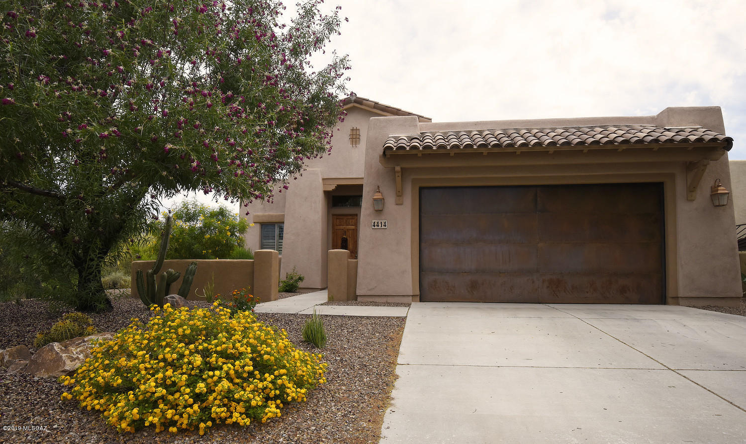 Welcome to gated community Sky Ranch in Marana - 15 minutes or less from Dove Mountain Ritz-Carlton, Tangerine Sky Community Park, golf, fine dining, hiking/biking trails, and Tucson Premium outlets. Easy access to I-10 for fast trips to Phoenix for business or pleasure. This home offers 10-foot ceilings, engineered wood floors, a new Trane HVAC, backyard fountain, covered patio, and plantation shutters. Move-in ready.
