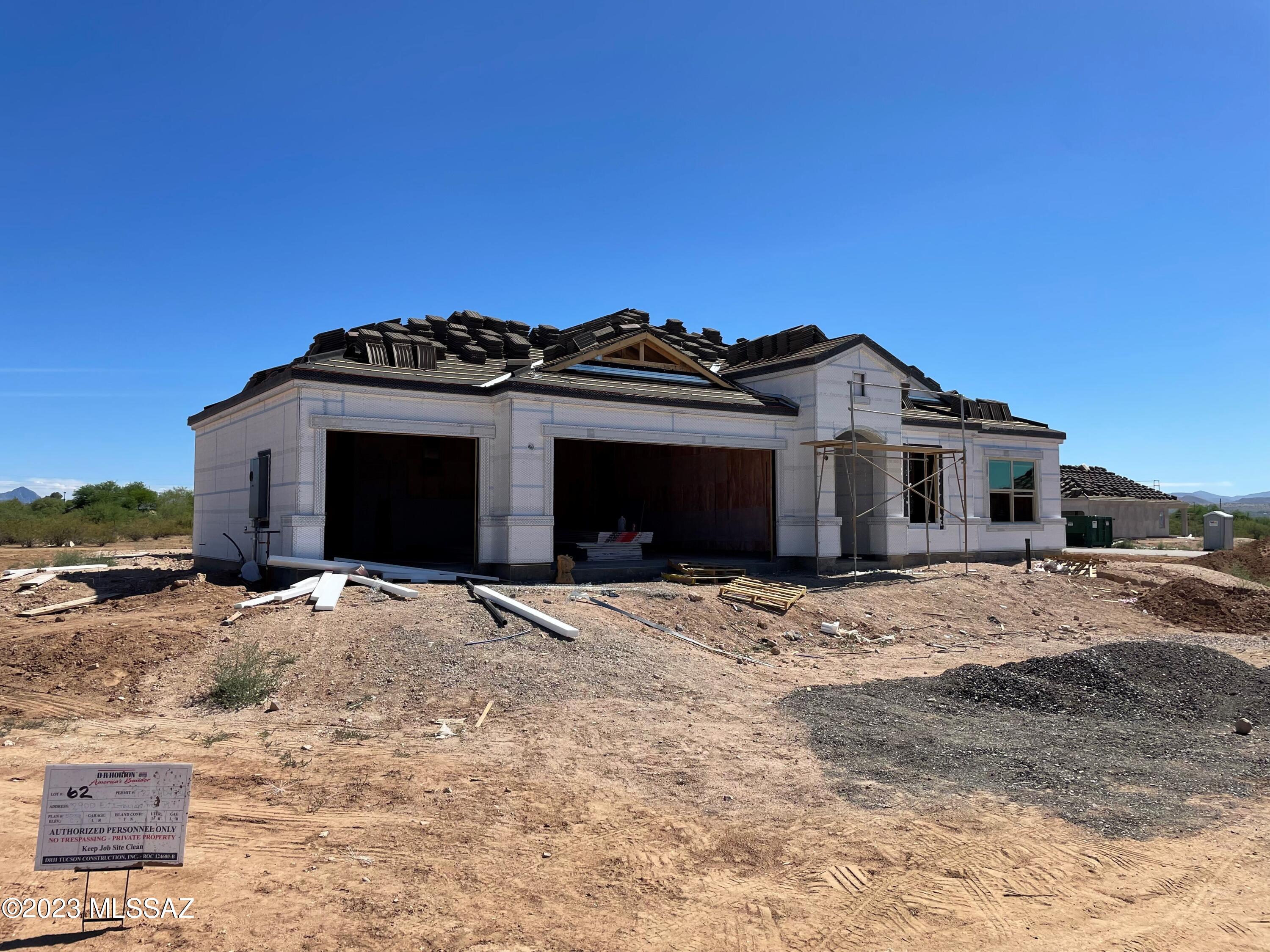 Our most popular plan the Citrine. Wide open floor plan in one of our newest Tucson communities. This home includes 9' ceilings, Quartz countertops, wood look floor tile, stainless appliances, dishwasher, microwave and much more all situated on a homesite that's approximately one and a quarter acre. Smart home technology package also included. Huge yard with plenty of space for pool. Fantastic views from the backyard to the Santa Rita Mountains.