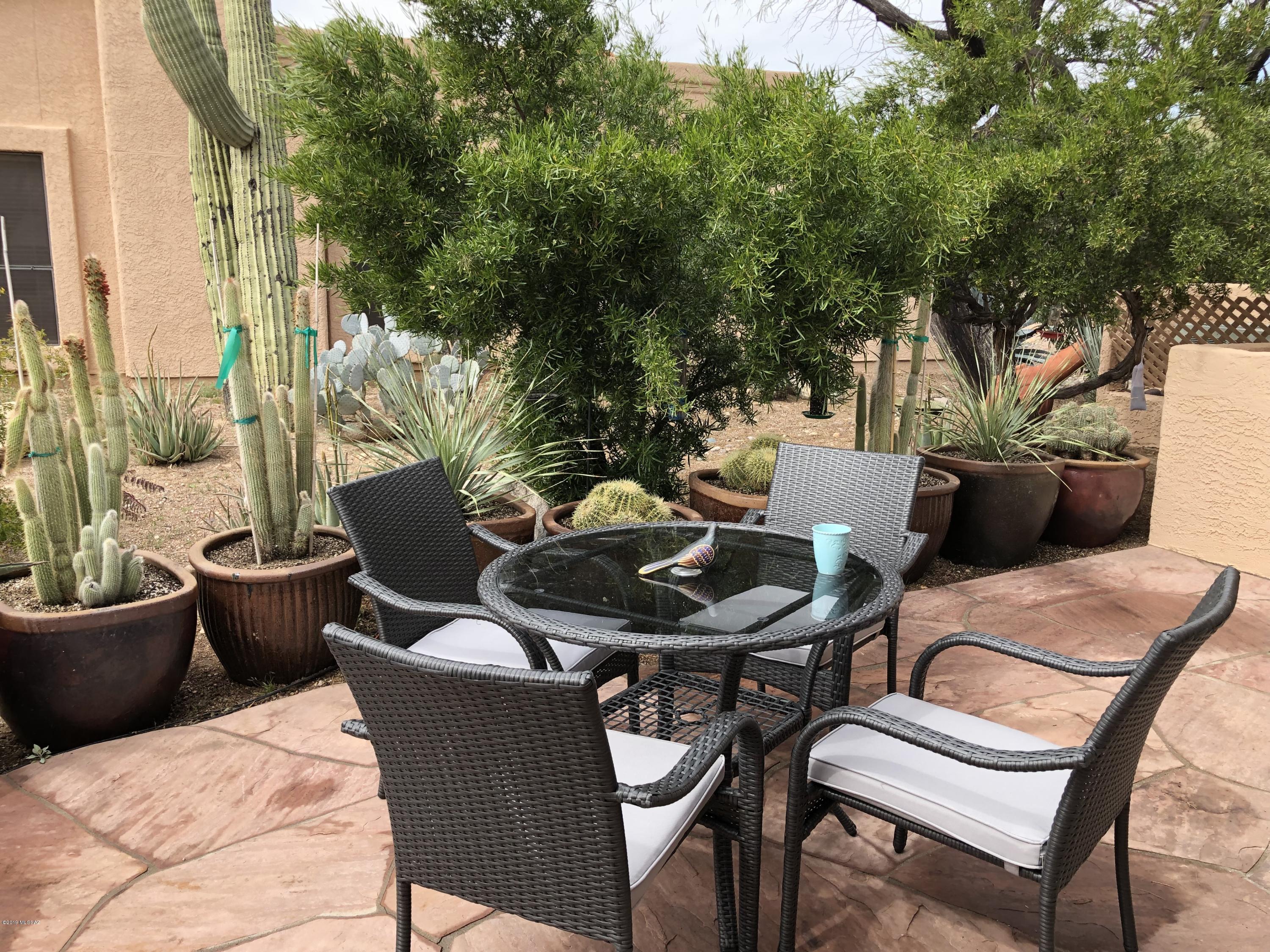 Updated townhome in the beautiful foothills of the Santa Catalina Mountain Range, the views are amazing, Tucson at it's best...The home has a private rear yard to relax and enjoy the year round sunshine.
The welcoming entry leads to the open great room with corner fireplace, the updated kitchen is well equipped.  Two good size bedrooms and bathroom make this the perfect place to call home.