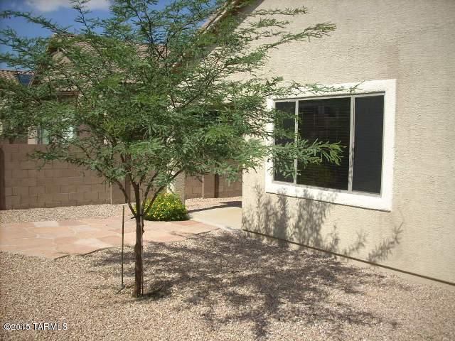 This home is in the beautiful Rancho Vistoso community within walking distance to parks, sport courts, playgrounds, and dog parks.  Step inside to a charming spacious home with a terrific eat in kitchen and secluded master suite. The master bath features dual sinks and a garden tub for a spa like touch.  You’ll love spending time outdoors just as much as on the inside. The back yard is beautifully landscaped and features an extended flagstone patio and the front yard has great views of the Catalina Mountains.      The refrigerator is included.  It can be rented for 12 months or longer.