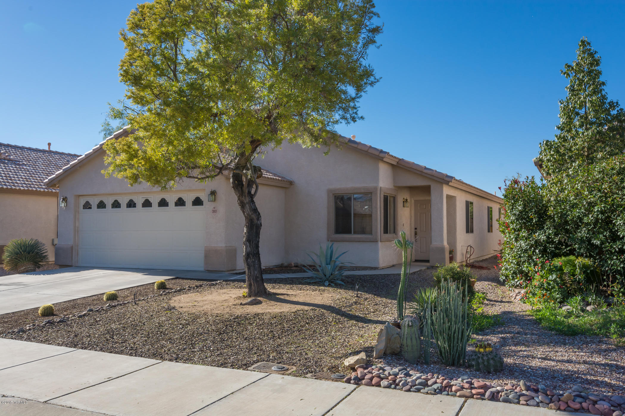Move in today into this meticulously maintained 4 bedroom 2 bath contemporary home in a desirable Neighborhood across from Tucson National. Features include a split bedroom plan, vaulted ceilings, spacious open kitchen with plenty of cabinets and counter space plus an island counter. Double French doors lead to a large private backyard with covered patio and gazebo. Perfect for entertaining. Separate laundry room, 2 car garage with custom-built work station and drop-down attic storage. New Lift Master garage door mechanism,
12/05/15. Great location, close to Foothills Mall, Pima CC, Northwest
Hospital, YMCA, golf courses, restaurants, & easy access to I-10.