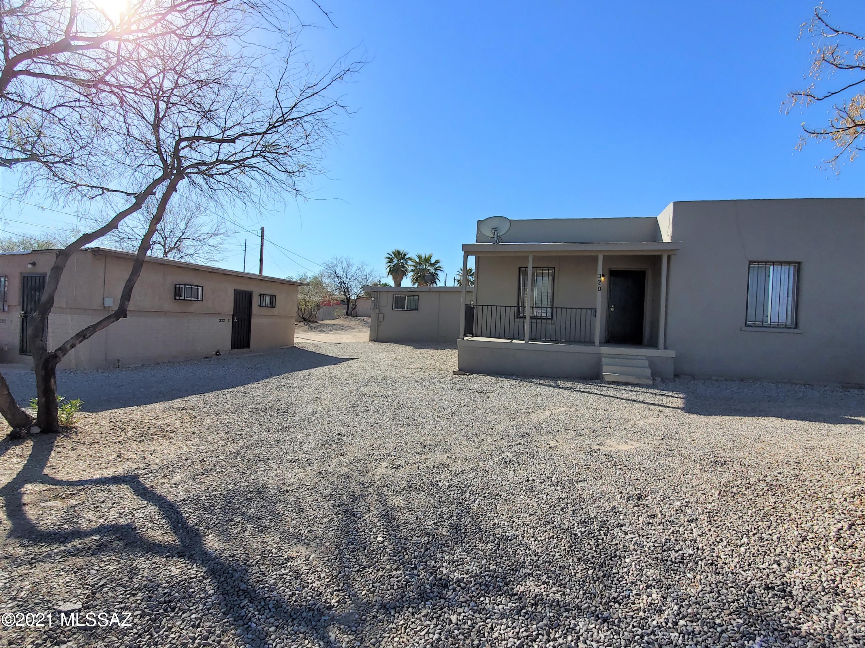 Across from VA Hospital.  3 buildings - 4 units.  322 E. Ajo is duplex with 2 studio units.  320 E. Ajo #1 and 320 E. Ajo #2 are 2BR/1BA units.  Owner/Agent