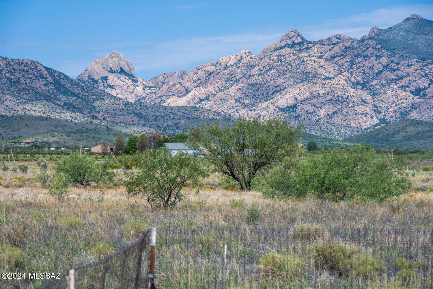 PRICE DROP! Discover the ideal site for your dream home on this ready-to-build 4-acre lot in Sunsites. Enjoy stunning views of Cochise Stronghold and the Dragoon Mountains, and marvel at the dark skies and the Milky Way from your backyard. The property includes underground power and features a shared well and well house right on the parcel, with an installed water line and meter. The desirable RU-4 zoning permits the Cochise County Opt-out, providing exceptional flexibility for your build. This prime location offers the perfect balance of country serenity and convenient access to town. Additionally, you have the option to purchase four adjoining lots on the well-share, with the seller open to combining parcels to enhance your vision. This exceptional lot is ready for your custom retreat.
