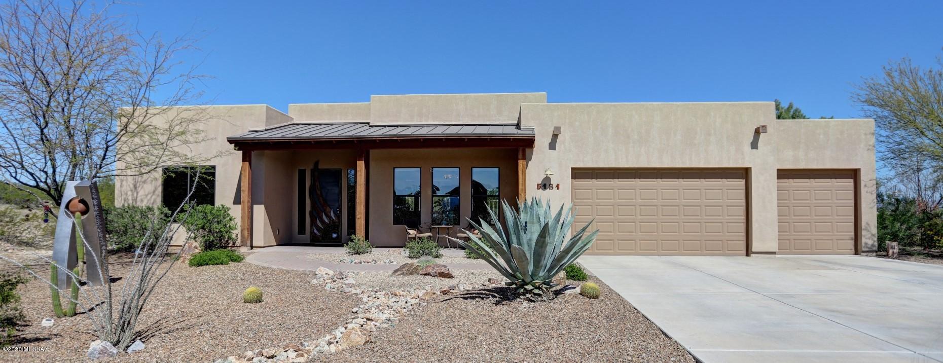 You have found it! This gorgeous, west-side light and bright southwest contemporary home sits on one acre in a cul-de-sac! What else could you be looking for? A large kitchen with a breakfast nook? Check! A dining area for your large family table? Check! A split floor plan with spacious bedrooms and a fantastic master suite? Check! A separate den to be used for a media room or office? Check! Room to entertain inside and outside? Check! An over-sized, three-car garage? Check!  This home checks all the boxes.  When you visit, please take note of the many, unique art pieces by the artist/homeowner.  It is worth the time to come take a look!!  Art work does not convey but is available for purchase.