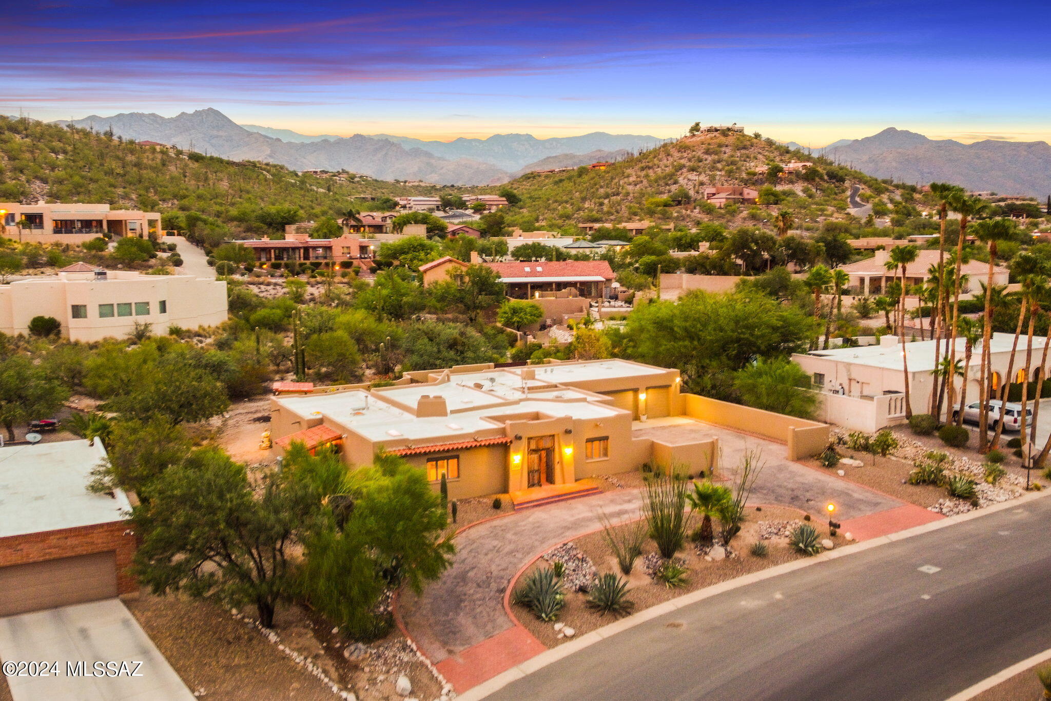 Ready for your very own private oasis in the desert? Look no further! This rare home offers resort style living with pool and spa. An entertainers dream with built in BBQ, artificial turf, your own putting green, mountain views and cabana! As if the outside isn't enough, the inviting foyer enters you into a bright open concept offering two large living spaces and see through fireplace. Relax in your living room with your very own wet bar. The gourmet kitchen offers granite counter tops, cooktop with hood, huge island, and walk in pantry. Formal dining room or at home office. This home also offers an oversized garage and large driveway to store all your toys!! Desirable location in Sabino Vista. Close to hiking and restaurants. Call to set up a showing today!!! Will not last long!