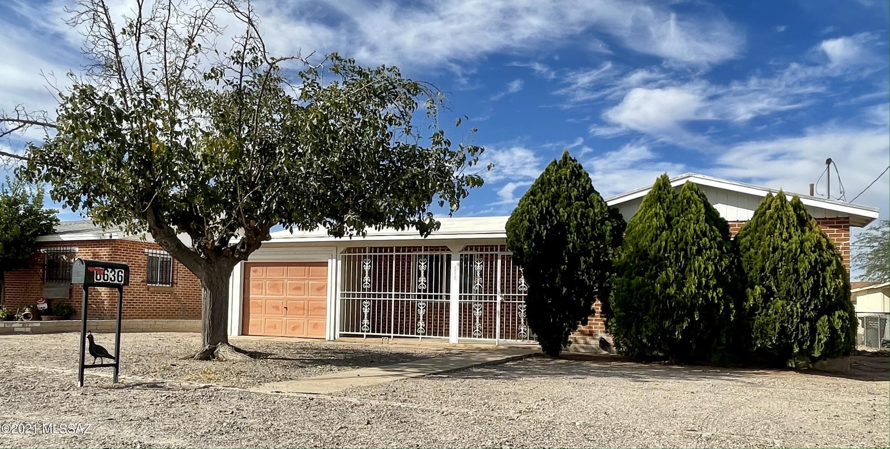 You will love this move in ready 3 bedroom 1 bathroom brick home on a large lot.  Newer AC, updated windows, security bars, recently painted, walk-in closet and a bonus mud room, large backyard, rod-iron enclosed front patio and plenty of spaces to park.  C1 zoning!