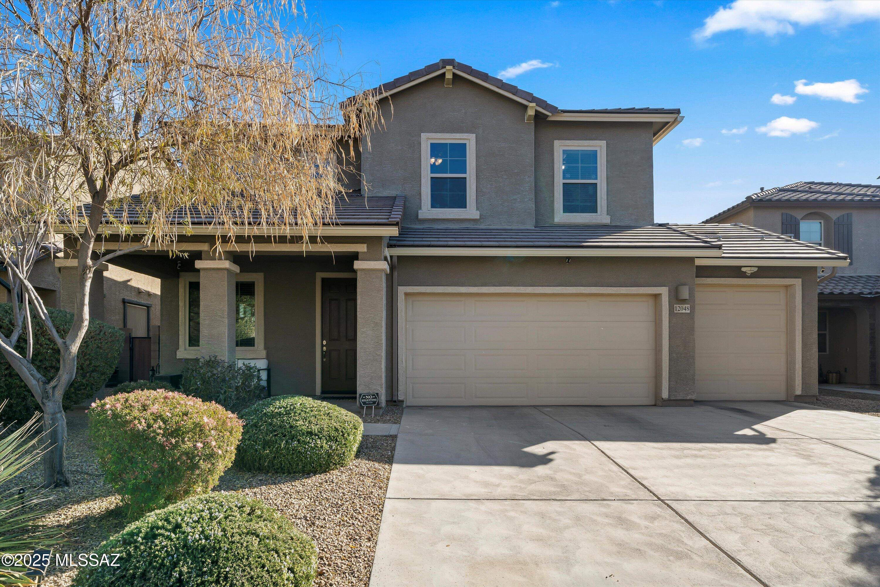 Beautiful family-friendly 4BED/3BATH + 4CAR Garage in desirable Gladden Farms community is waiting for you! Avoid the wait of building a new home! Beautiful & spacious floor plan perfect for entertaining guests. Wood-like ceramic tile throughout & carpet upstairs. Gourmet kitchen features stainless steel appliances, new white cabinetry, double-oven, built-in microwave, single-basin stainless sink, and granite countertops. Split-bedroom plan allows for extra privacy in the large owners suite. Gorgeous wood barn door to owner's ensuite that includes double vanity, new white cabinetry & large walk-in shower with tile surrounds. Bedrooms 2 & 3 feature fully custom walk-in closets & blackout curtains. East facing backyard & covered patio is beautifully landscaped and includes solar string lighting & children's play equipment. 4-car garage has brand new Polyaspartic flooring thats much more durable than normal epoxy flooring, & attached overhead storage allowing for extra space for cars & toys! Solar equipment is owned & fully paid off. Come check out your new dream home!