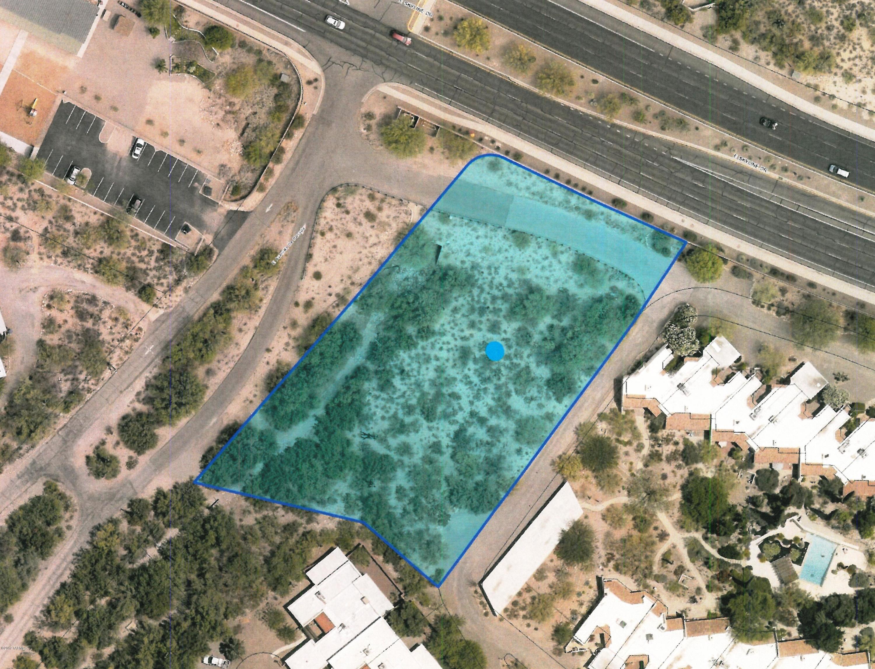 Great opportunity to purchase a rarely found primarily TR zoned 1.38 acre lot by Skyline and Campbell with multiple potential uses (SFR, Condos, Townhomes, Apartments, Office, Assisted Living & More).  Lush desert vegetation with gorgeous mountain views.  All utilities to lot line.   Detailed survey attached to listing along with zoning code uses.    Possible building ideas are also attached to listing.   Ideal business or residential location near La Encantada Shopping Center and Westlin La Paloma Resort.  No HOA or governing CCRS.