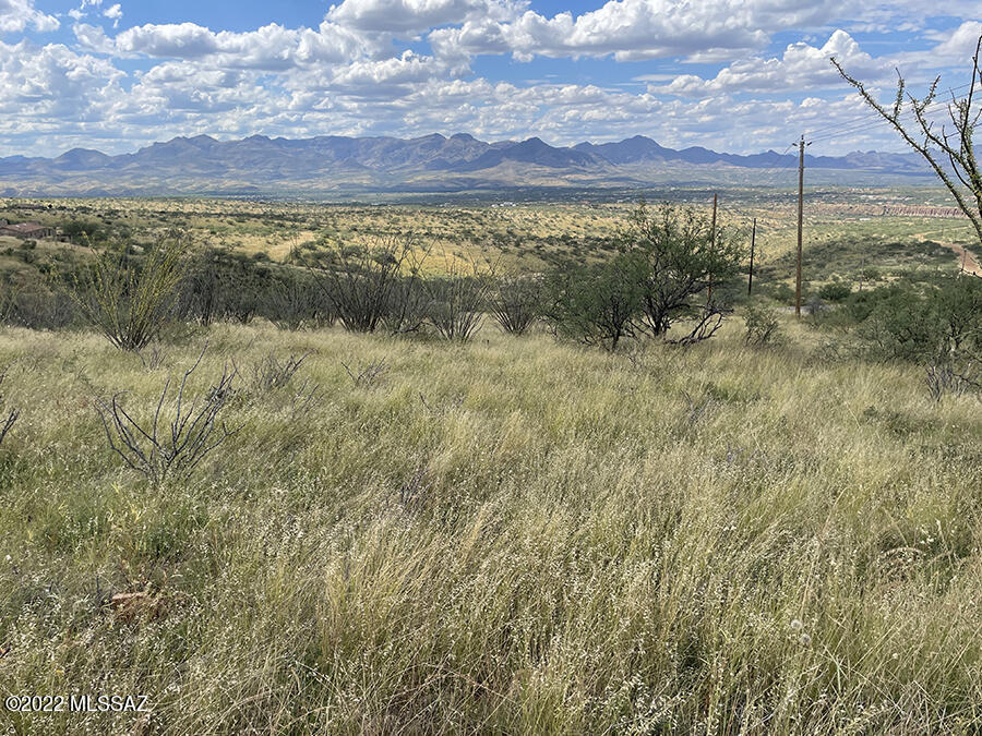 East Rio Rico high country above the Santa Cruz River Valley, 5 miles from the freeway. Peaceful setting to build your home with surrounding mountain and valley views.