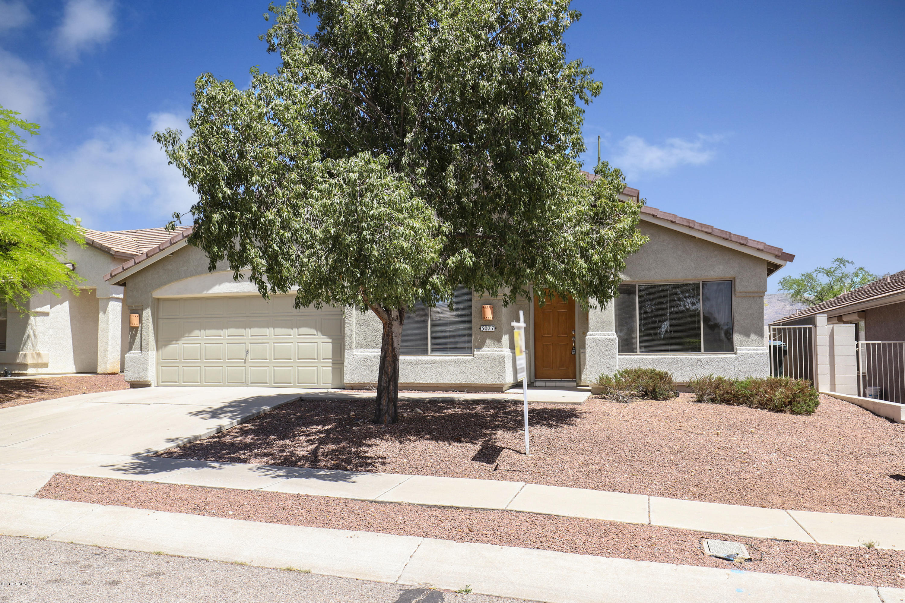 Enjoy the relaxed lifestyle in this tastefully upgraded split-floor plan, 5-bedroom 2-bath home located in a private and immaculately maintained neighborhood.  Enter the home into a large formal living and dining area. There is a huge room off that area which is perfect for a large bedroom, playroom, office or craft room. All new appliances and granite tile countertops, await you in a sparkling kitchen that opens to a spacious dining and family room area with tons of extra space and natural light. The master suite also features a generous bath with walk-in closet, double sinks, walk-in shower and garden tub. Room for the whole family! New Paint, New carpet, New flooring and kitchen and bath updates... - This home is spotless!