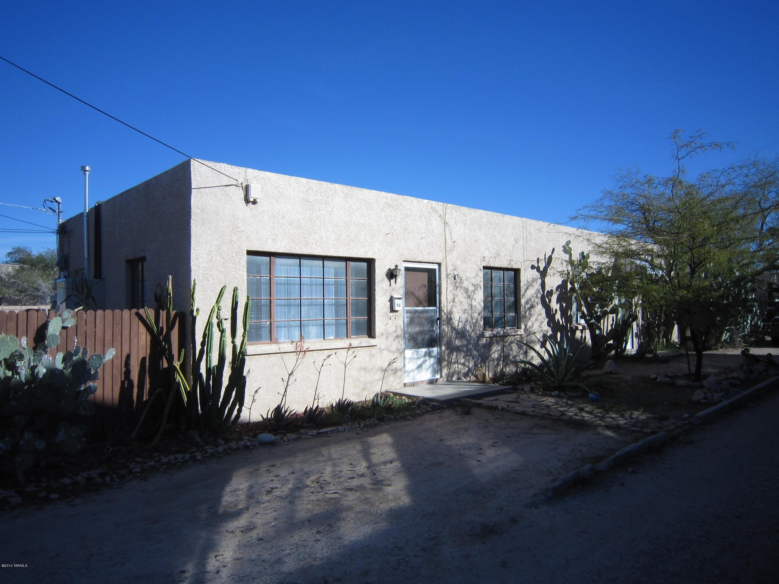 Central 1 Bedroom Duplex with concrete floors, stove & refrigerator, Beamed ceilings, washer hook-up, private fenced yard and Evaporative Cooling. Water is paid, tenant pays gas & electric.