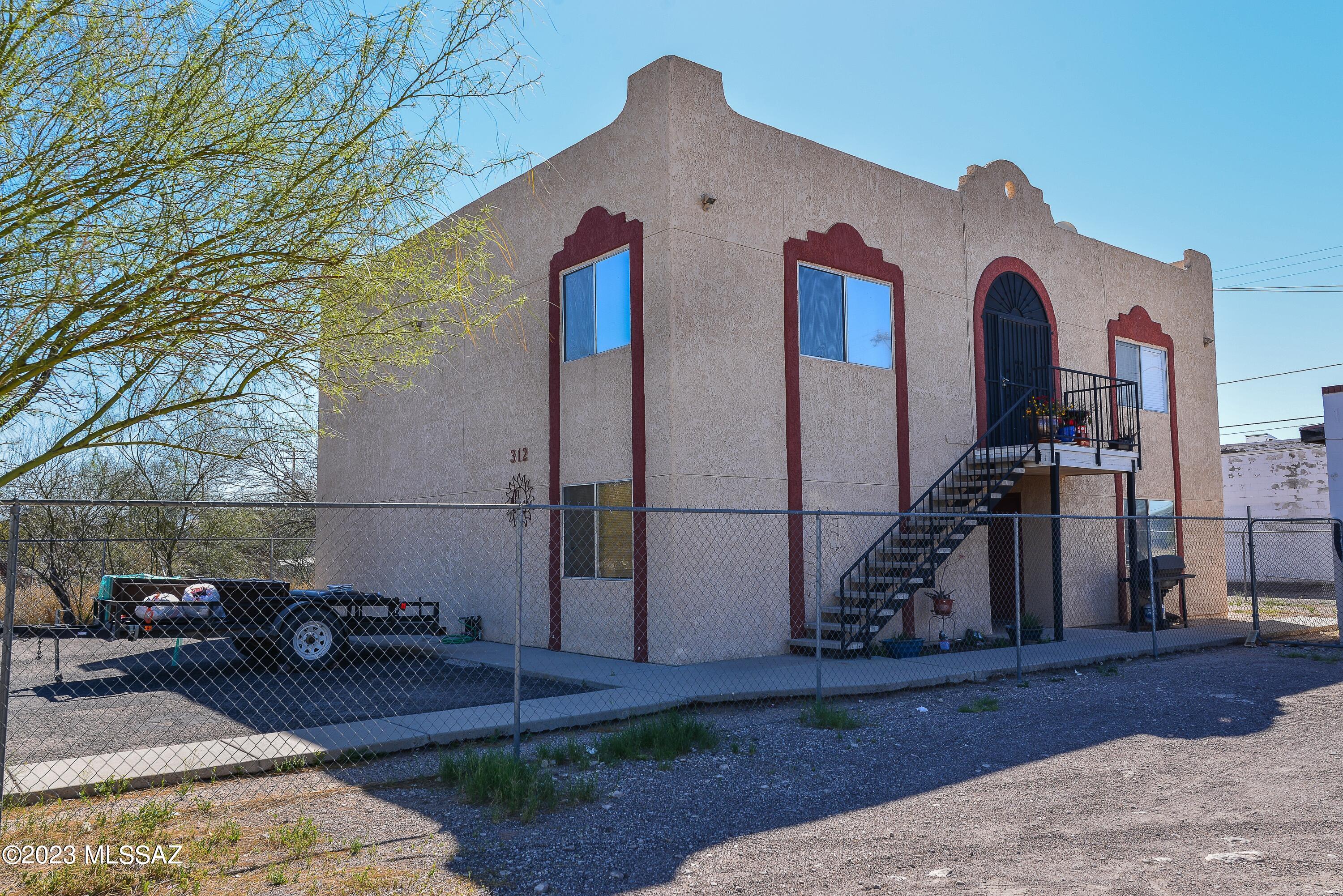 2 Bedroom 1 bath apartment in a unique gated community. On bus path, Located off of 4th Ave near I-10 and down town, surrounded by restaurants like the famous El Nidito and the new first of its kind in Tucson, the indoor food court, American Eat Co. & market. Newer AC will keep you cool. This cozy home is ready to move in. Newer floors, fresh paint, new windows and window coverings. No indoor laundry faciities, but Laundromat is located just across the street.