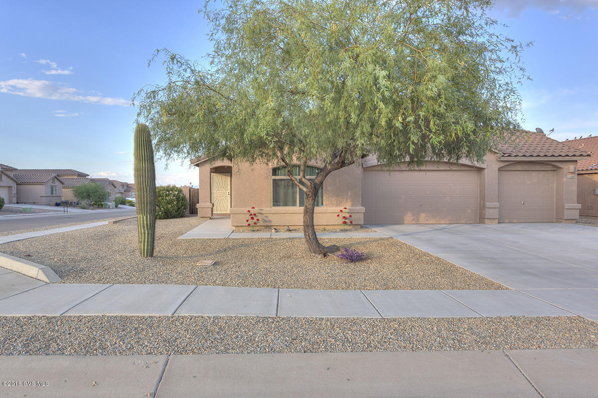 This fabulous home on an oversize corner lot with a 3 car garage is perfect for entertaining! An open floor plan, and spacious backyard complete with professional landscaping. Looking for some room between you and the neighbors? This is it! The interior features beautiful and bright two-toned paint, upgraded light fixtures and large windows that let in lots of natural sunlight. Master Bath boasts Garden Tub and separate shower. Enjoy the Mountain Views from the large patio area or relax and unwind next to the soothing sound of the rock waterfall and pond. A three car garage offers you plenty of space for your vehicles, toys and extra storage space. The home is exceptional and has been well maintained and cared for. Exterior just repainted. Must see to appreciate all this home has to offer!