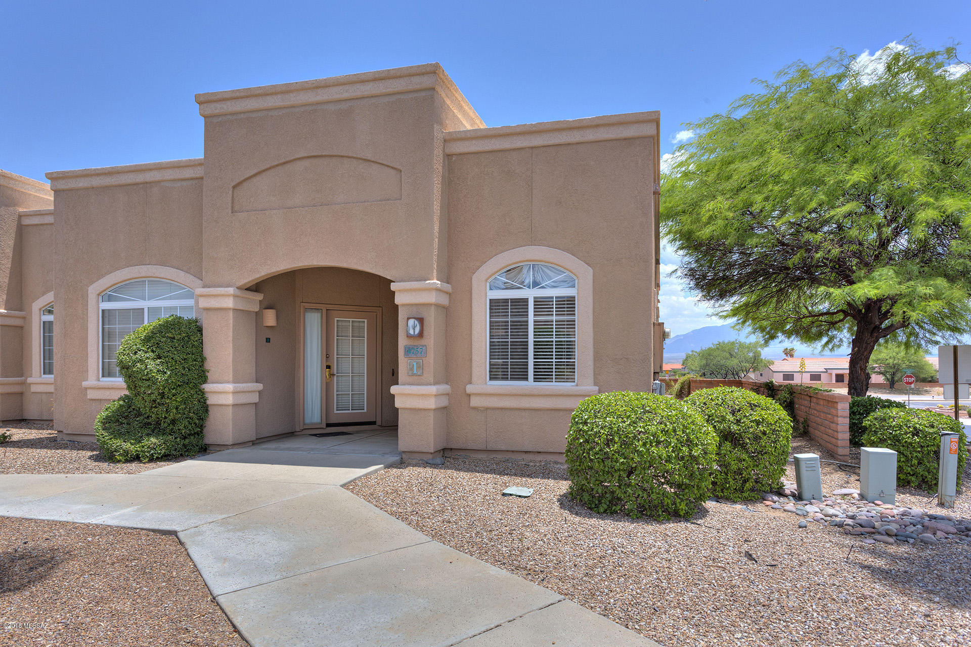 Mountain Views from great room and east facing covered patio. Two Master Suites with Lockout Door Between. Spacious Living Room. All Furnishings are included.  Property is leased for January thru March at $2400 per month, buy now and collect the rents.