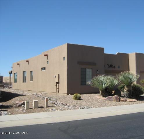 Very nice townhouse with the popular split bedroom plan .Great room features a wall of windows facing south for lots of lights and views. Patio has been extended for your enjoyment of the outdoors. Watch the sun rise and set. Wood burning fireplace, tile floors in all except bedrooms. Just steps from the very popular GVR Rec center with it's pool, spa, workout room and clubs. Walking trails for your enjoyment also.