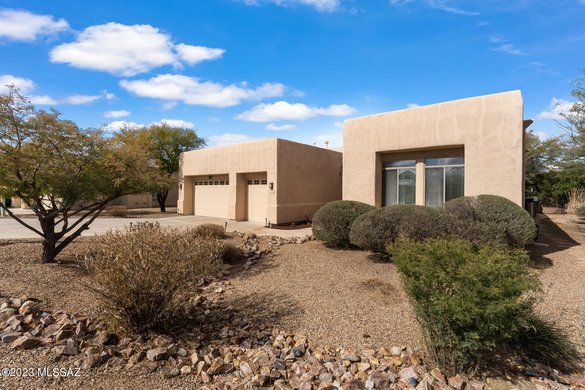 Fabulous home in Oro Valley's Copper Ridge. Close to everything yet nothing comes close nor does anything compare! This is a rare find in today's market! 3225 Square Feet, Split floorplan with 4 bed/3bath/3 car garage, 3 fireplaces and nearly ½ acre in a cul-de-sac, a sparkling solar heated POOL w/ water feature, Kiva Fireplace with banco seating in the Oasis backyard setting! Gourmet kitchen with 42'' hickory cabinets, granite counters, dazzling glass tile backsplash & an expansive island, menu desk, surround sound, coffered ceilings. The list goes on. A complete feature list will be posted in photo section soon! Plus! Highly rated schools – Wilson & Ironwood Ridge are just down the street! THIS HOME HAS IT ALL AND WILL NOT LAST!