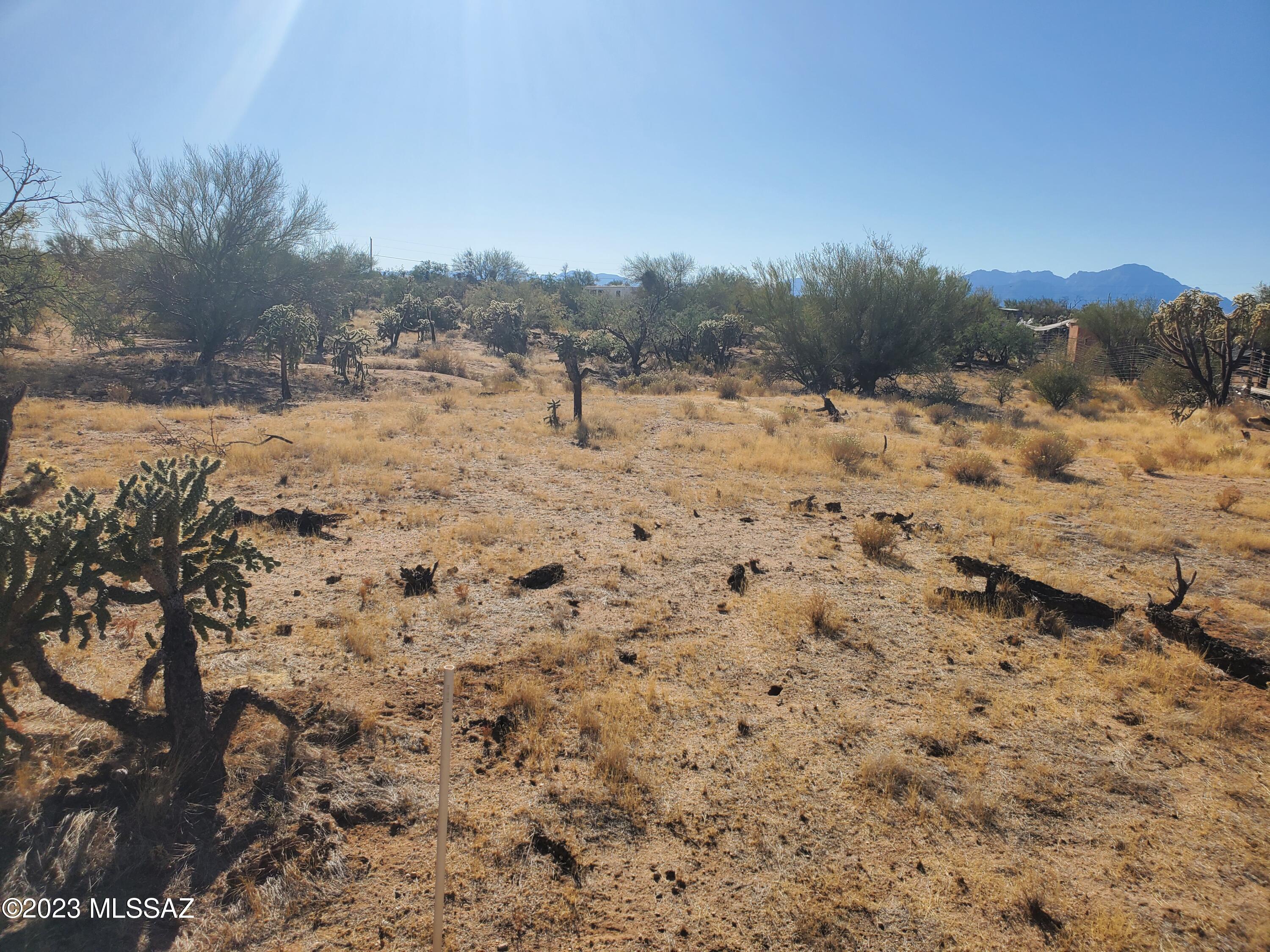 Rural, no HOA and mountain views. This 1.27 acre parcel has all that and more. If you don't mind a little dust on the tires, this lot is for you. Bring your motor toys and enjoy kicking the dust up. Build your dream home or slap a manufactured home on the land. The possibilities are abundant per the zoning code. Utilities are in the area. Buyer to verify during inspection period. Seller carry available with acceptable terms.