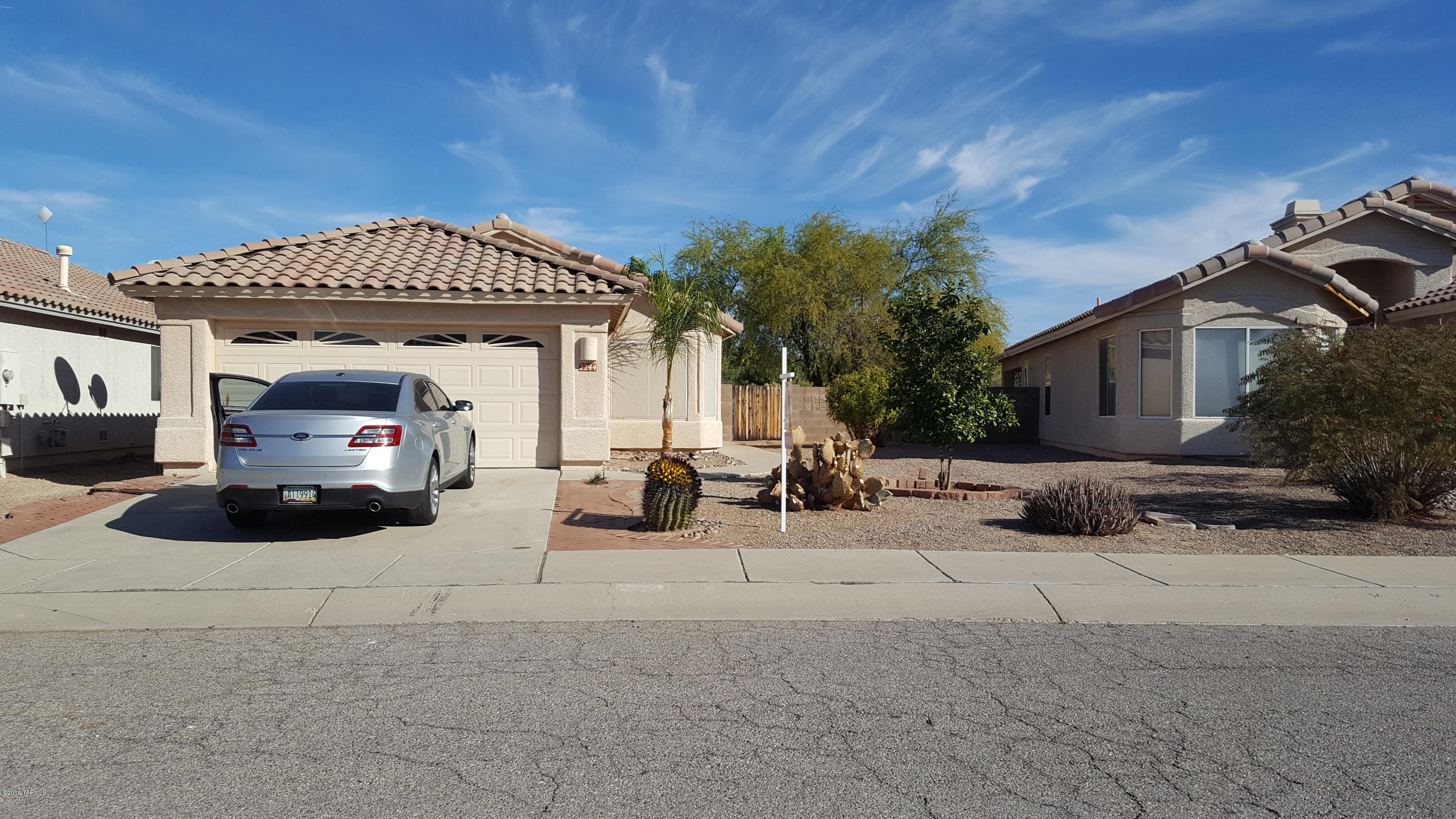 Lovely home in The Bluffs II community. Nicely landscaped front and back yard, large back yard with sculpture design pavers, patio accommodating a beehive fireplace.  Freshly painted interior, new tile in living area, hallway and  two bathrooms.