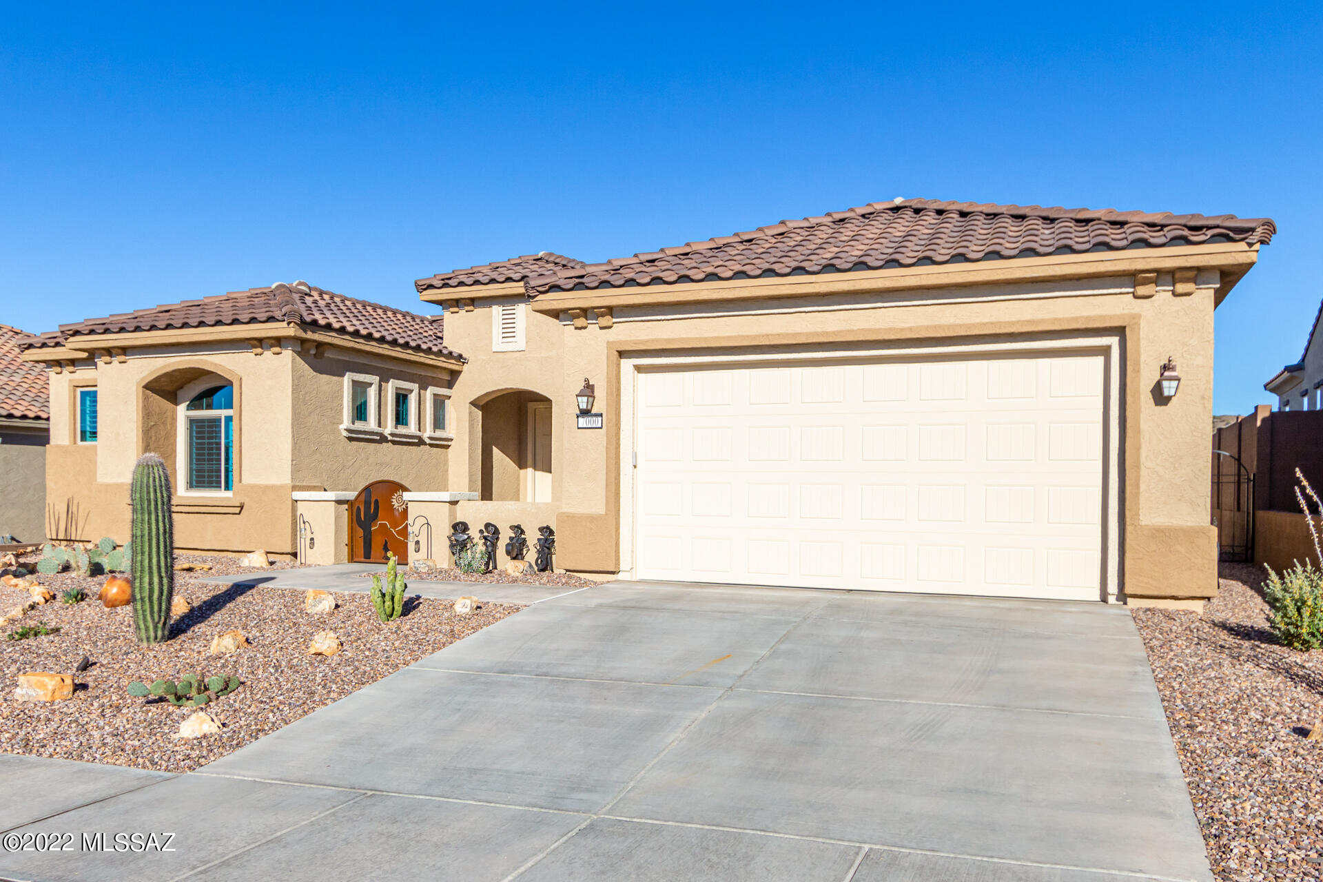BUILT IN 2021 with over $100k in upgrades!! Beautiful open Endeavor floor plan located in the highly sought after Del Webb 55+ community of Dove Mountain. Home features staggered 42'' kitchen cabinets, extra cabinets with beverage fridge, soft close doors/drawers throughout, HUGE pantry, built-in bench in mudroom, 16' sliders in great room, fully tiled super shower in owners suite, soft water & RO systems, french doors at den, insulated garage/garage door, 2' garage extension (2.5 car tandem). Custom backyard oasis with putting green, steel pergola with built in BBQ, fire pit, fountain, power patio screen & MORE! This home is turn-key & is still under warranty! Schedule your showing today!