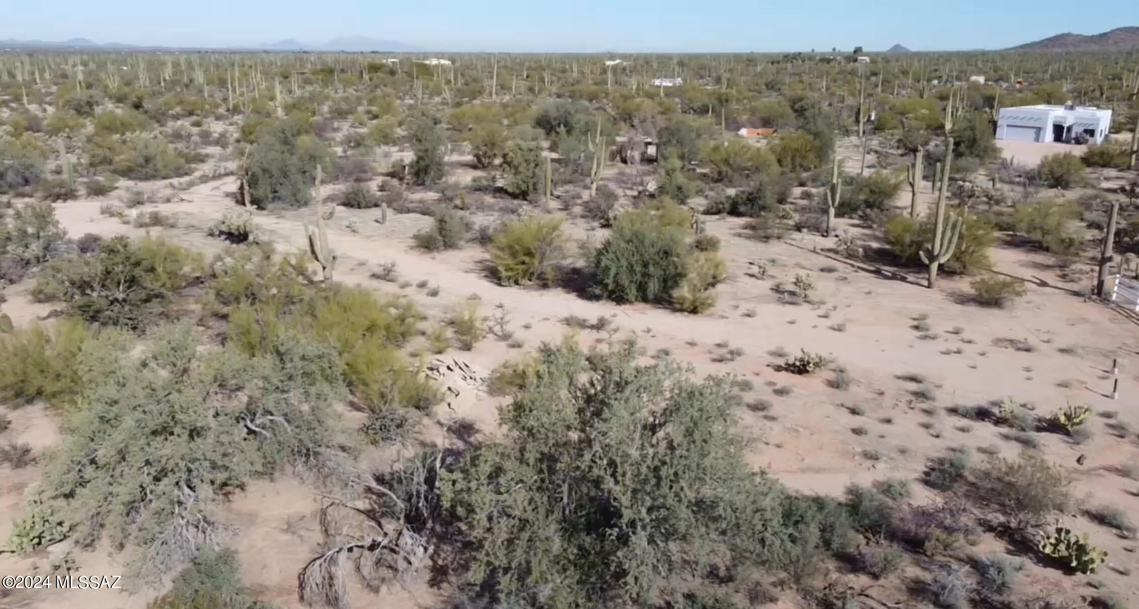 Come build your dream home on this large 1.9 acre lot in the foothills of Arizona. Close to electricity and water, this lot has amazing views of the mountains and saguaro national park. Easy access to this lot off of short dirt road from W Mile Wide. Septic is installed already from previous home.