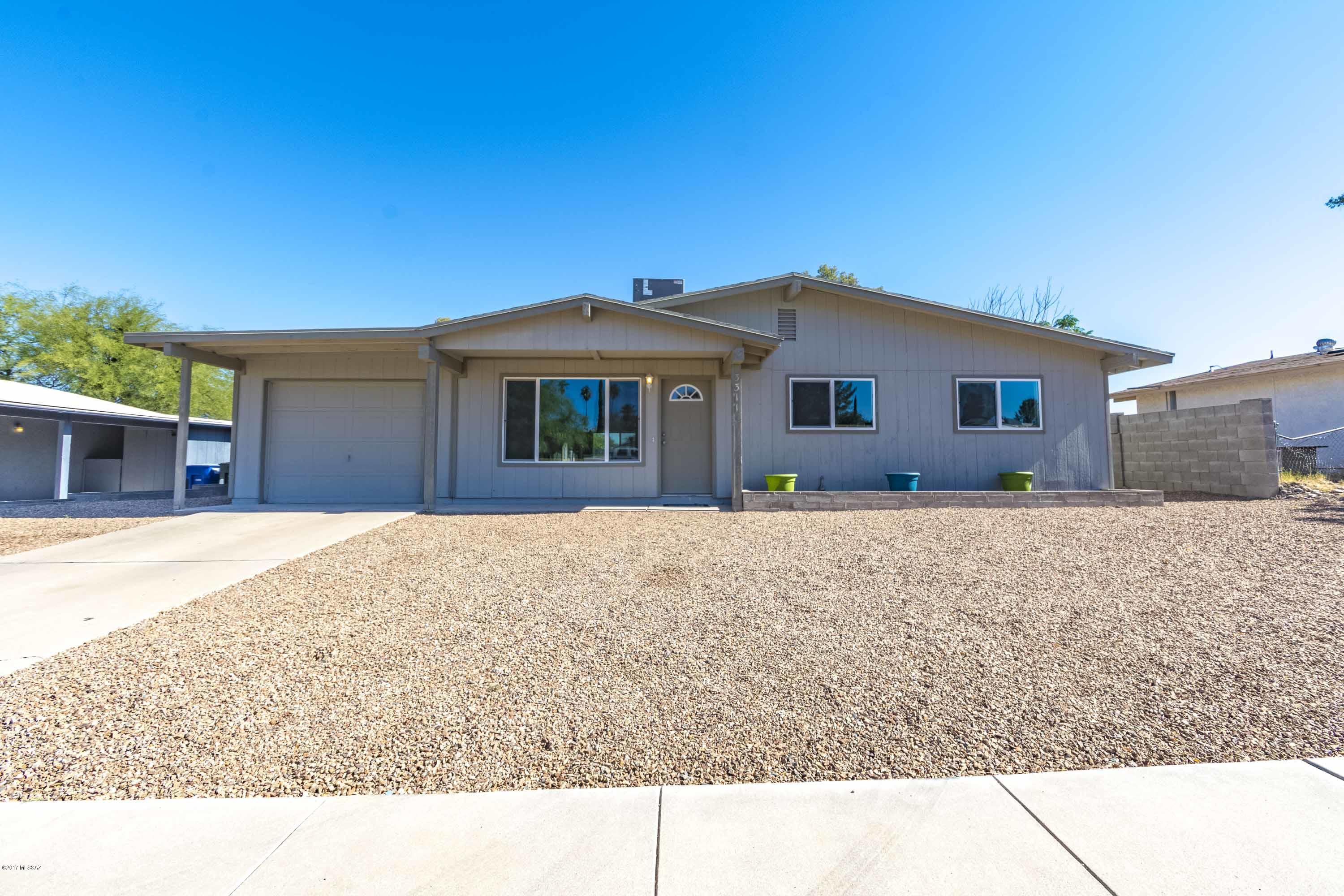You’ll love this gorgeous remodeled 5 bedroom home. The floor plan encompasses FIVE bedrooms with plenty of room for study, sleep and storage, two luxurious bathrooms, an open kitchen and a great room that flows through to the dining room and family room.  New granite counters, new upgraded stainless appliances, island, new flooring, new carpet, new bathrooms, new lighting and new DP windows. One of the nicest homes in the area, this one won't last. Owner/Agent