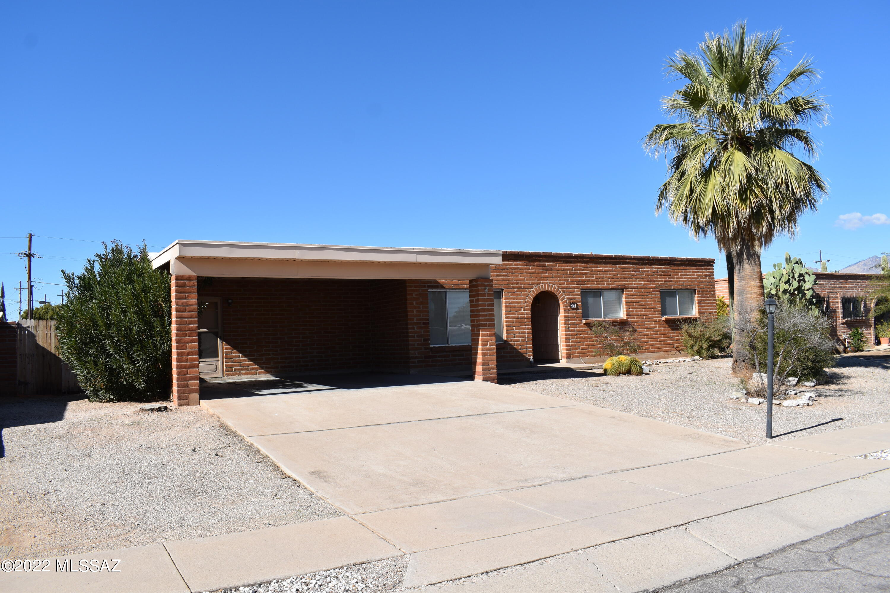 Large, well maintained 4 bedroom/2 bath burnt adobe home with new flooring and paint throughout, newer water heater and plenty of storage. Come see today!