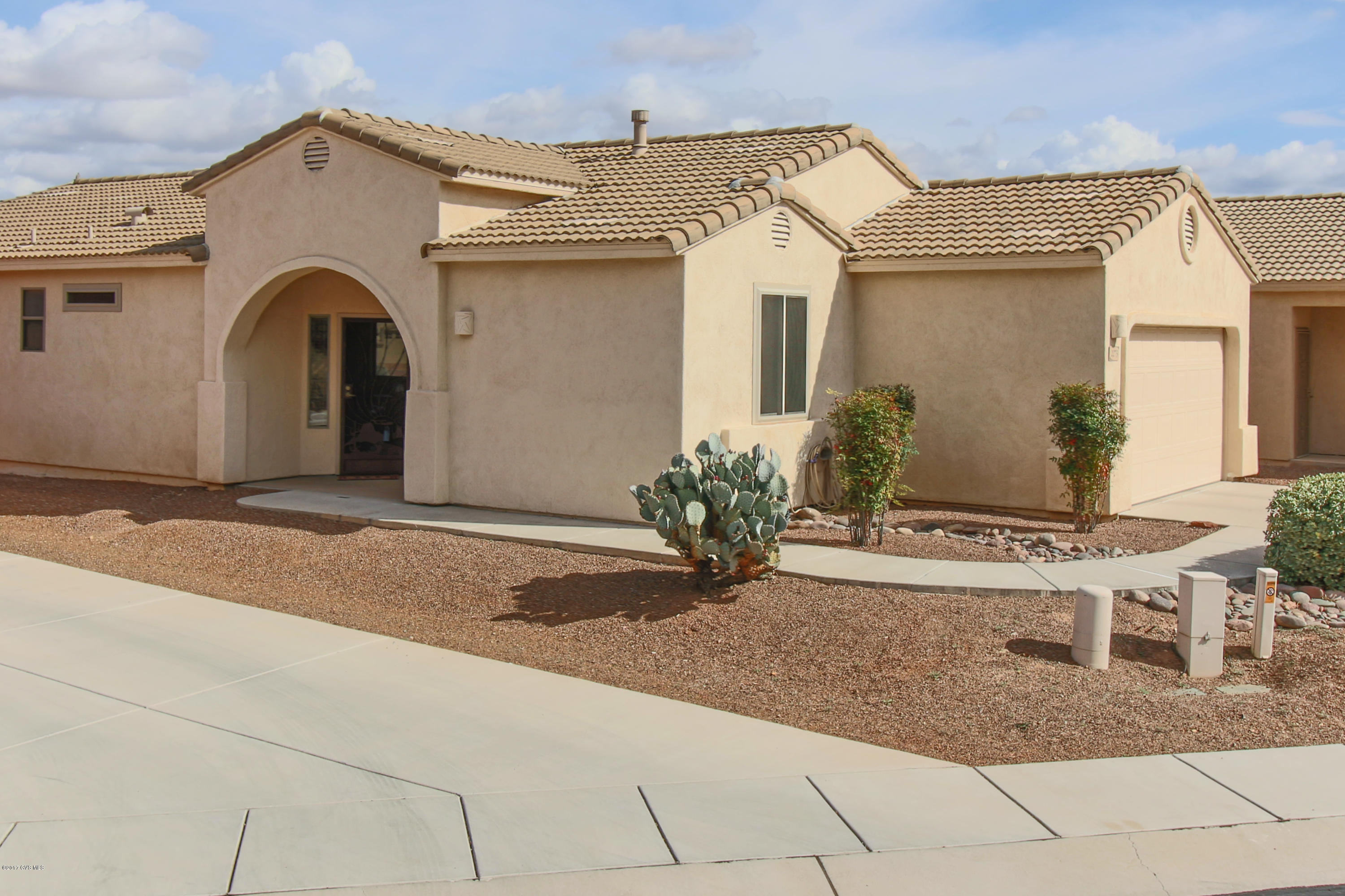 Just walk in and start living in this lovely, extremely well maintained home. Open floorplan makes this home great for entertaining. This is the extended Palmer floorplan and also has an extended garage. Enjoy the mountain view from your covered patio. The Legends also offers the convenience of a community pool and spa.