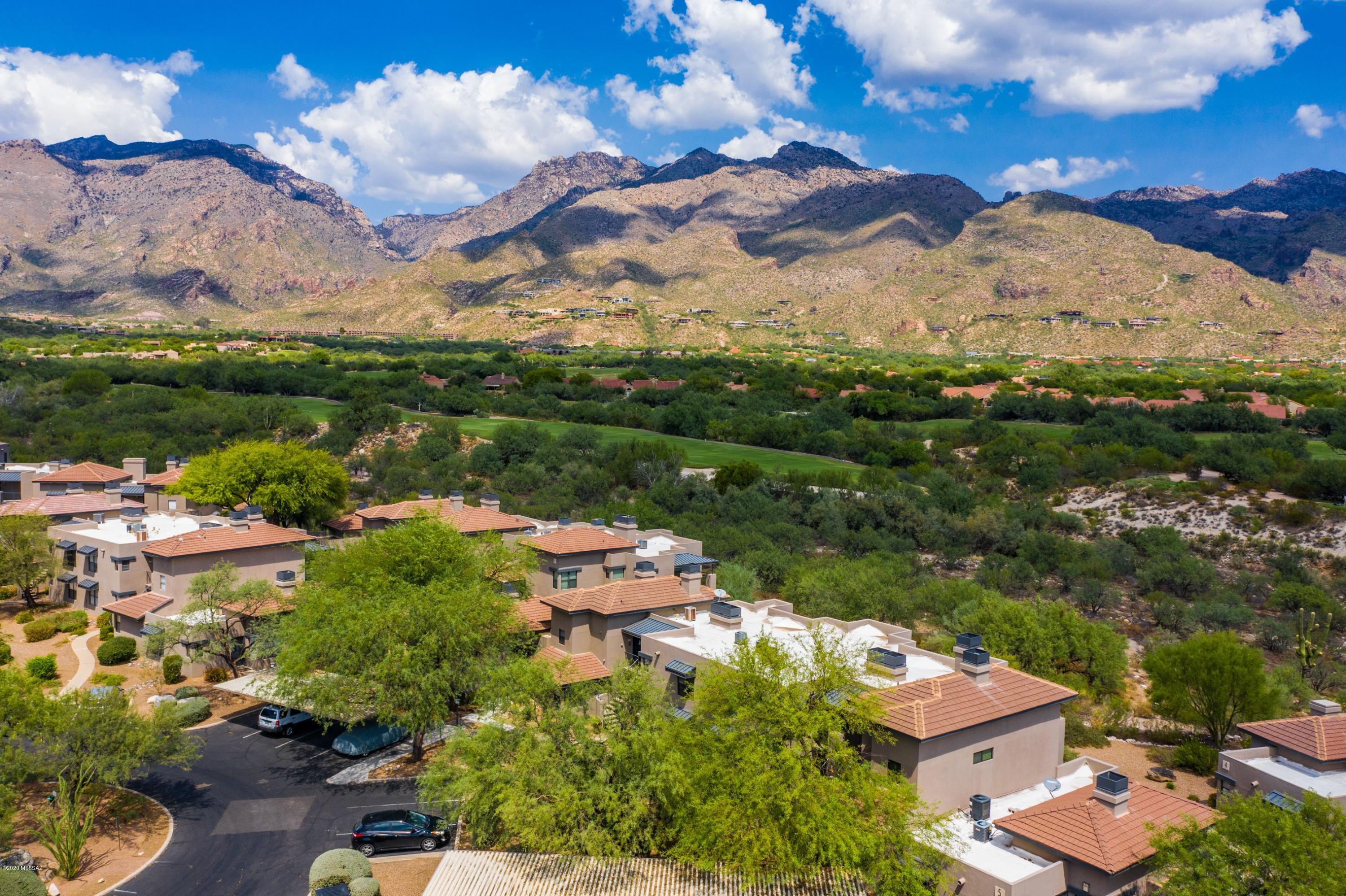 AMAZING VIEWS AND RENOVATION.  This c is a premium condo, it has both VIEWS & SUPERB renovation.   The sellers completely renovated the condo. In 2019 a new HVAC & water heater was installed.  Very Impressive rental history!  This property would make an excellent investment or personal home.  The Greens is an extremely popular community with 3 pools, 2 spas, a fitness center, and many social activities.  The community is located in a breathtaking beautiful location in Ventana Canyon. It is the  RESORT LIFESTYLE.