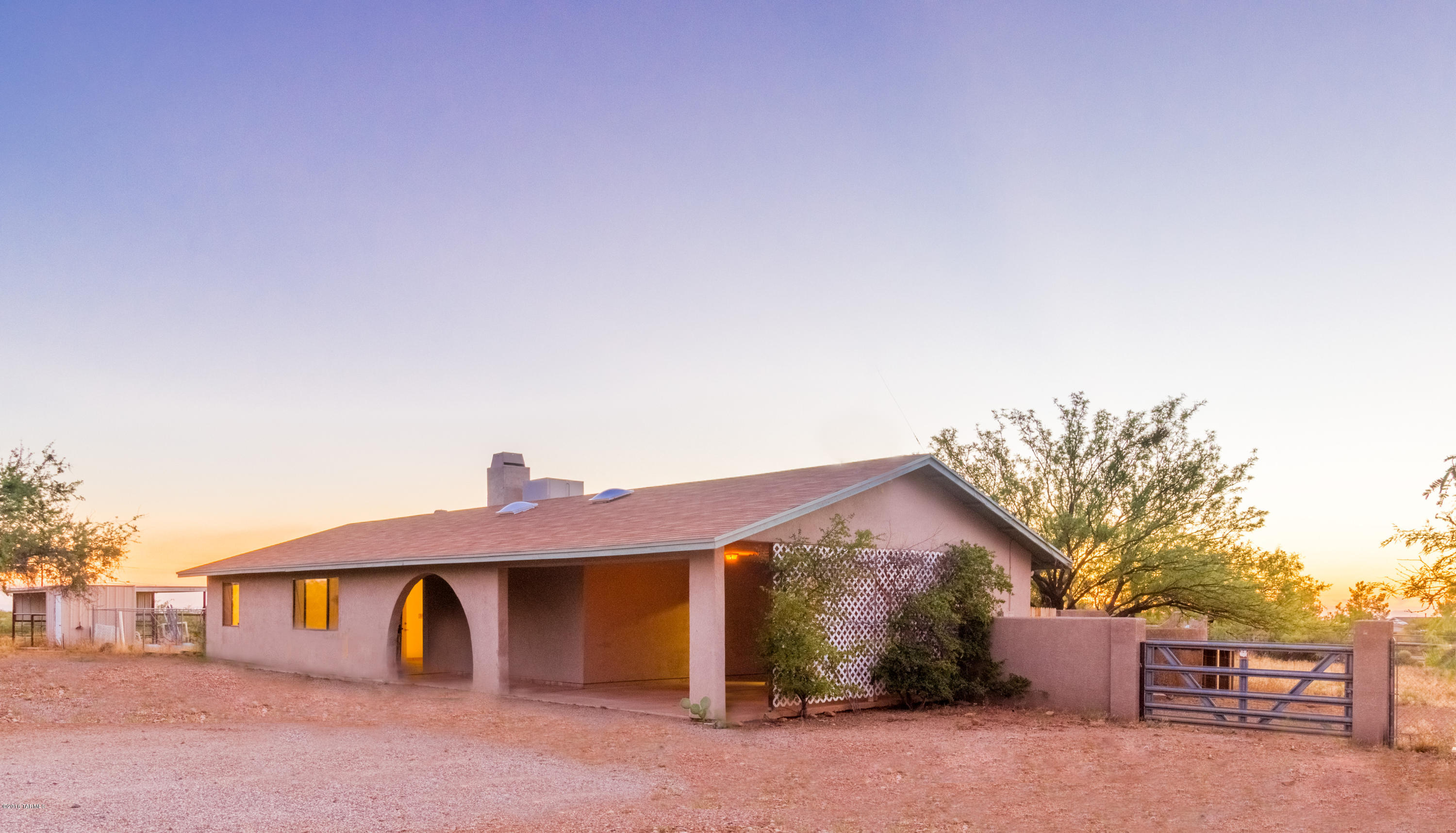 Beautiful horse property nestled in a spacious desert setting with mountain views and more. Only 5 minutes from I-10 and quick access to downtown and more. Located in the Vail School District which is one of the best in the state. The home features a long den on the back of the house. Unique design with a fireplace open on both sides to the family room & kitchen. Large back porch & nice outdoor grill area to enjoy the beautiful Arizona sunsets. Home sits on 1+ acres. Very popular area. See additional docs for air conditioning quote.  Owner notated that swamp worked great because of higher elevation.