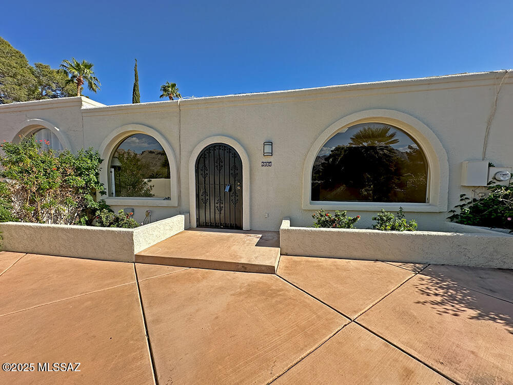 Beautiful 3 bed 2 bath, single level home in highly sought after Hidden Valley Townhomes. This meticulously maintained home has fantastic views of the Catalina Mountains, and features Saltillo tile, hardwood flooring and ceramic tile throughout. Updated bathrooms and kitchen with a modern, southwest feel. All appliances included. Large storage closets in carport, new HVAC 2024. Roof replaced in 2017, recoated April 2025. Large private patio with built in planters and drip irrigation. Close to pool and spa. HOA includes pool, spa, clubhouse and trash. The Hidden Valley Townhomes were developed in the 1960's and 70's and are unique and sought after properties. Mature landscape and large trees cover the property. Walking distance to Sabino Canyon, Three Canyons Beer and Wine Garden and more