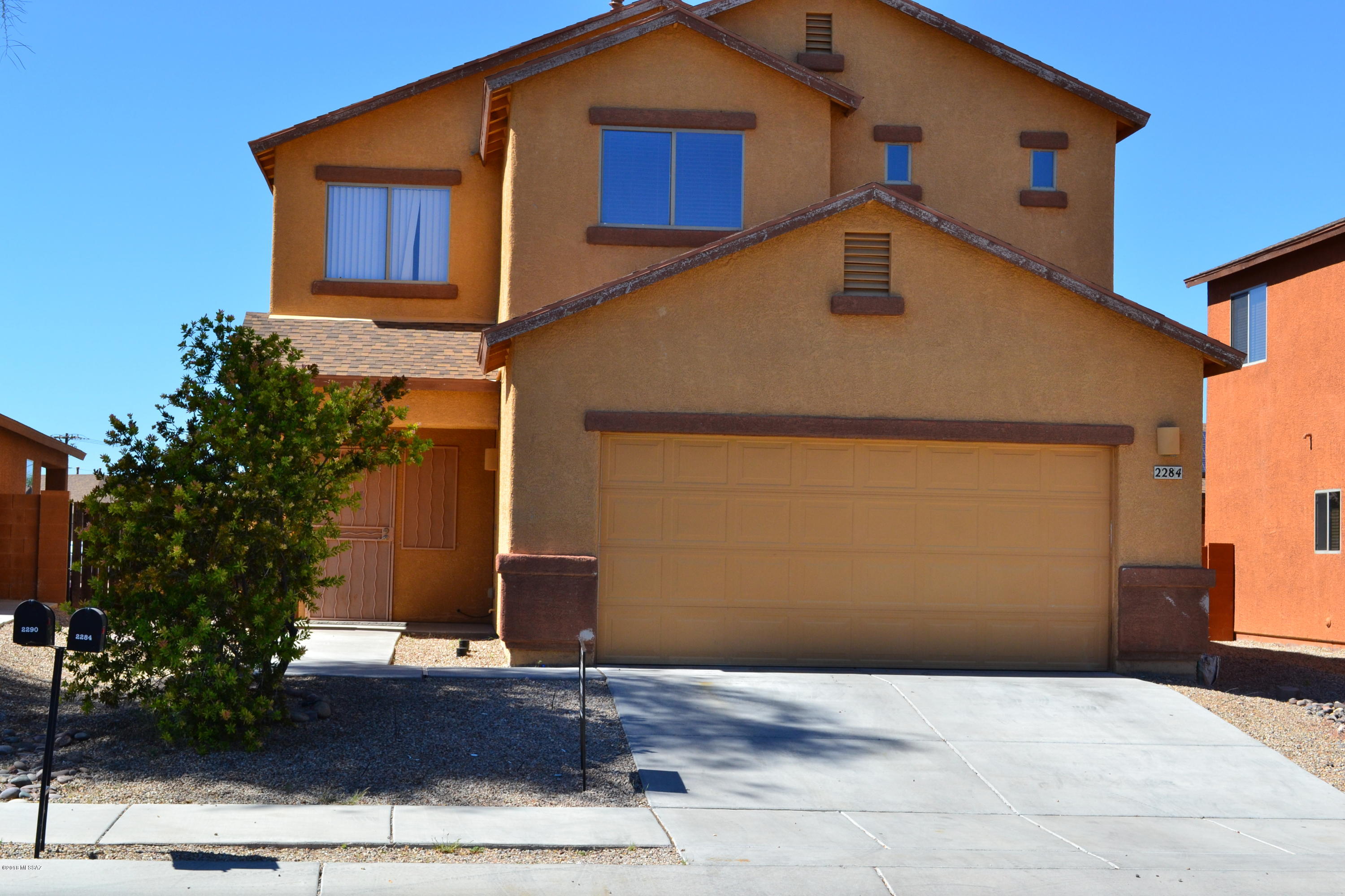 Spacious 2 story home, 4 bedrooms, 2.5 baths, large living room, spacious open kitchen, , laundry room, a/c, 2 car garage, large enclosed backyard with awesome Arizona Room.  This is a No Pet Home.