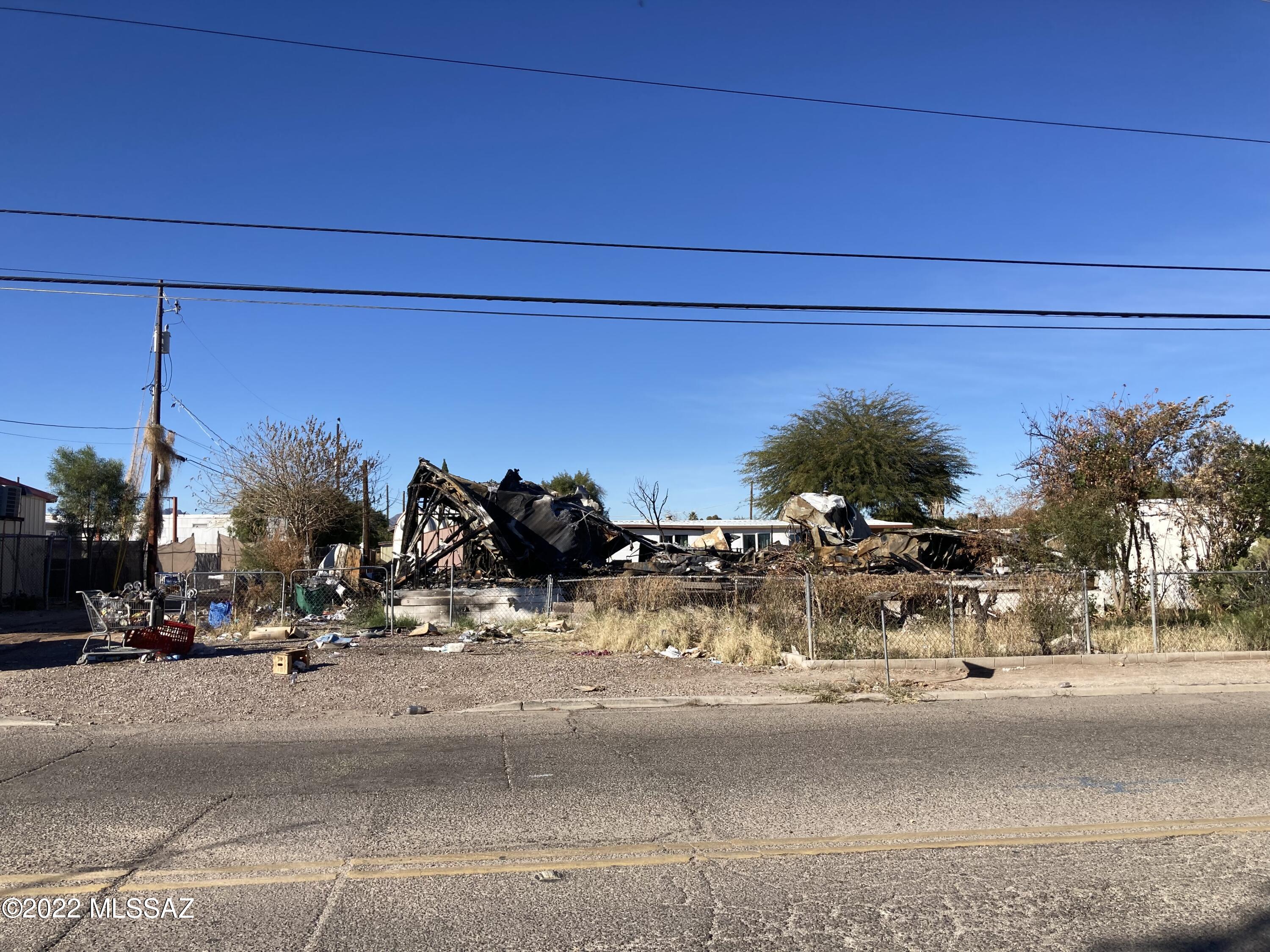 Burned out Affixed Manufactured home with block foundation - sold As Is - utilities on property - haul out the trash and bring in a new manufactured home - great investment or first timer. Talk to your dealer about a package.