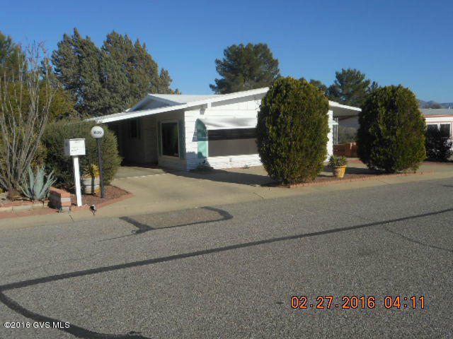 WOW!! Lots of space in this 2 Bedroom, 2 Bath home with large Arizona Room (not included in square footage). Total square feet 1876. All windows replaced (except in MBR). New sub-floor 2009. Remodeled bathroom shower. Newer kitchen cabinets, stove top, micro, washer and dryer. Good sized workshop/storage room. |\n|Roof re-coated May 2016. Great recreational facilities include heated. pool and spa, library, ceramic, exercise and billiard rooms. Along with shuffle board, horse shoes and bean bag toss. Close to shopping, doctors, restaurants and Green Valley Hospital.