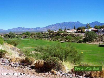 One of the best Views in the'' Desert Hills Casita's'', can be seen as you open your front door! 
From watching the ever-changing colors made by sunsets, sun-raises on the Santa Rita Mountains to watching the wildlife that gather at their watering hole on the Desert Hills driving range.
Your cook will love the Newer Whirlpool French door Refrigerator and Microwave.This Casita also, features a built in-four shelf linen closet!
Besides having your covered parking right at your front door.