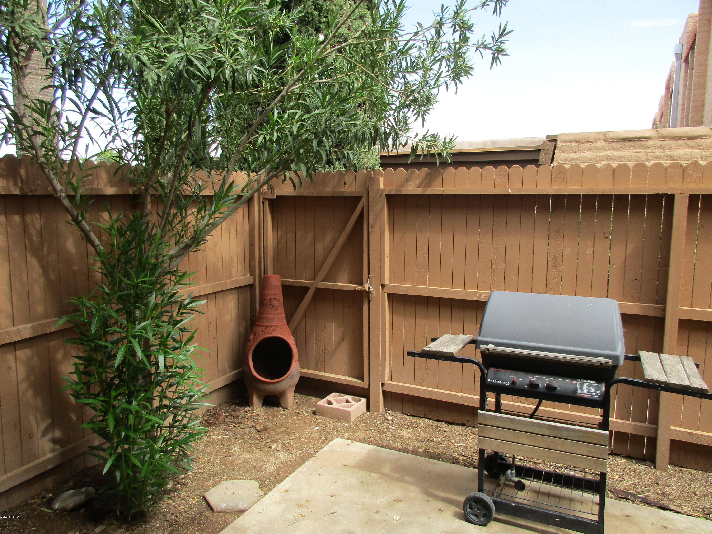 Not far from the University of Arizona, this centrally located Townhouse with MOUNTAIN VIEWS can be a great investment, leased by students and faculty alike. With 2 bedrooms and 2 baths and a carport, the unit is also CLOSE TO BUS ROUTES as well as shopping, restaurants, banks, medical and everything else that downtown has to offer. ALL NEWISH LAMINATE FLOORING THROUGHOUT DOWNSTAIRS! Note the storage room off the carport, and additional parking is readily available. The BBQ stays with the buyer. Note that the bathrooms have been remodeled/upgraded. The complex has a pool, spa, clubhouse and laundry facilities. COMPARE TO OTHER UNITS -- THIS IS PRICED TO SELL!! Come by and take a peek...you won't be disappointed!!