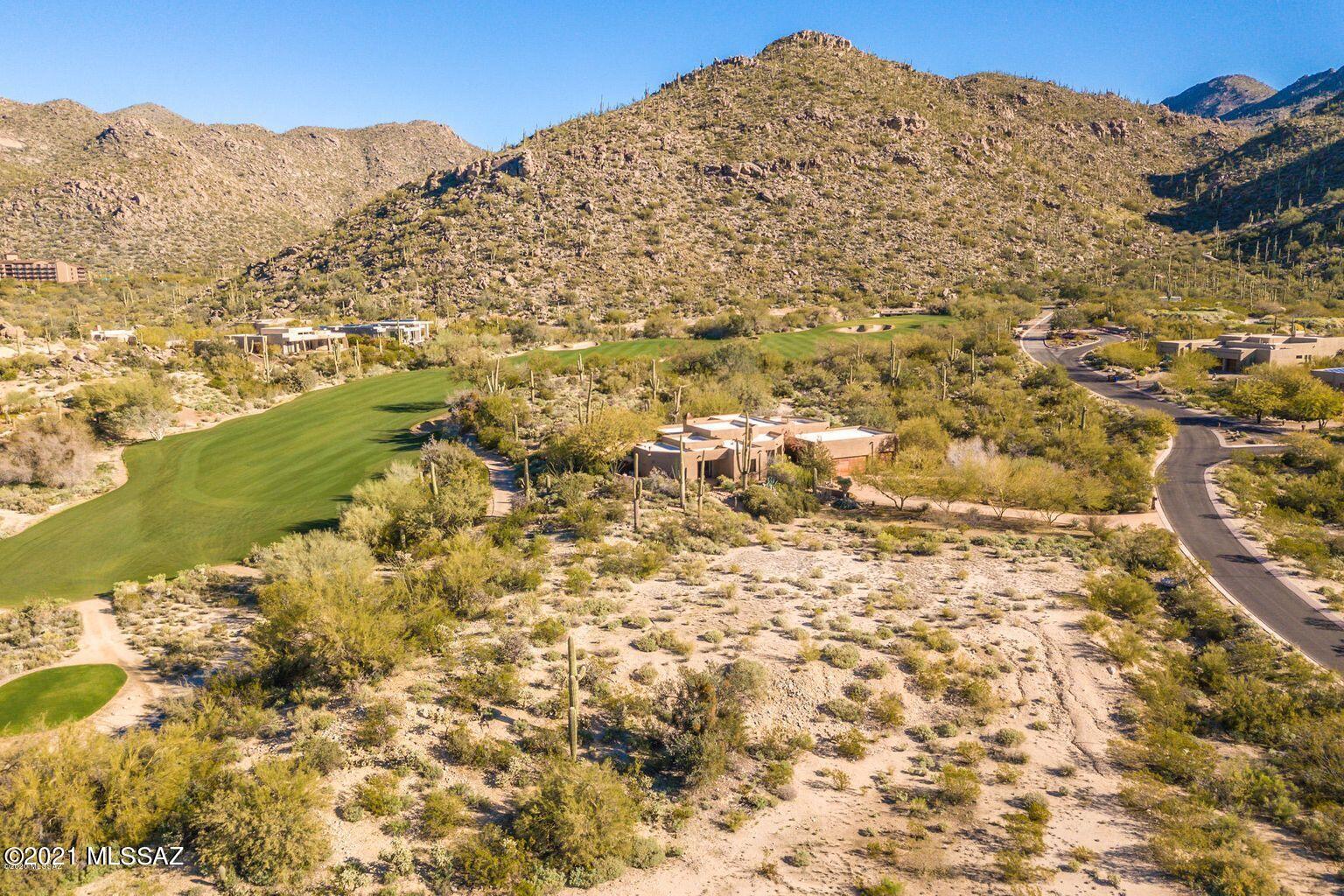 A level, easy building pad is ready to go. You can't see the Gallery golf course to the west due to a small hill, but you are near the cart path which you can utilize for your evening walks around the course. Quiet area if that's what you seek. Amazing sunset views from your rear yard.  Like the neighbor next door, you'll need a small culvert under your driveway to access the building pad from the road.