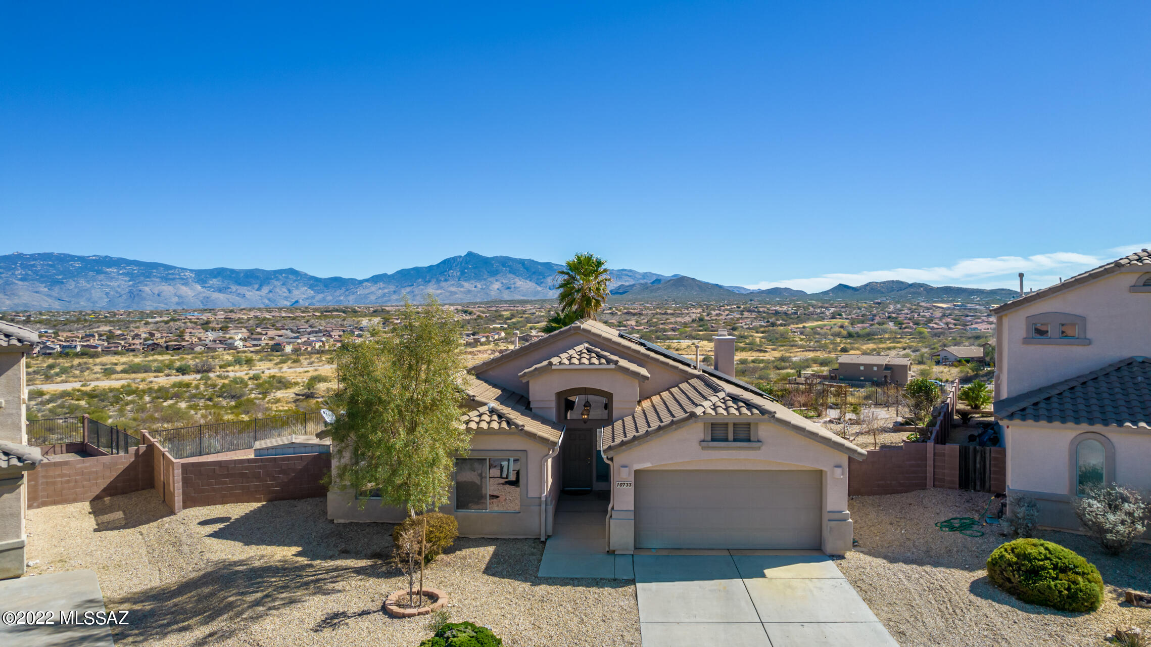 Wow! Stunning corner lot with large backyard is the perfect oasis to enjoy unimpeded views of the Rincon Mountains and spectacular sunrise/sunsets. Imagine waking up in the morning and drinking your coffee in this incredible lush backyard with panoramic views of Vail. This beautiful 4 bedroom 2 bath property is just what you have been looking for. Updated and open floor plan with plenty of natural light. This location and lot can't be beat, minutes to all the Vail schools/shopping and that backyard will be the envy of all your friends and family. Property does have a solar lease that will help lower your monthly electric bill and will need to be assumed. This home is ready for you, come see it today!