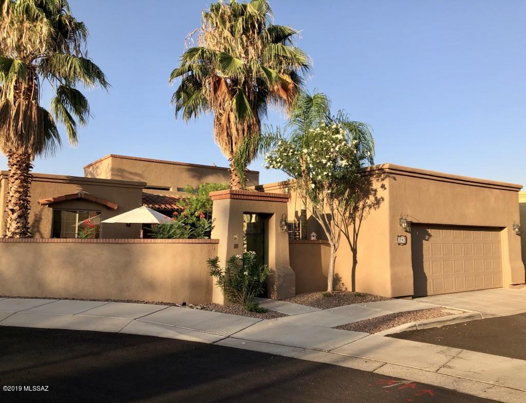 This small, secluded gated community of 18 free standing, architecturally pleasing homes will delight & surprise you. All the conveniences of living near an urban center, & all the serenity of living in the suburbs. The courtyard is filled with birdsong & sunshine, yet the home is just paces away from a grocery store, restaurants, French bakery & more. This home was the developer's model & has many upgraded features. From the colorful front courtyard, enter the light-filled great rm with 14'exposed beam ceiling, polished concrete floors, French doors, fireplace, & clerestory windows. 3 BR, 2B, an office/den with its own exterior entrance, full laundry room with cabinets & built-in sink, newly painted walls, freshly sealed concrete floors & a new refrigerator complete the package.