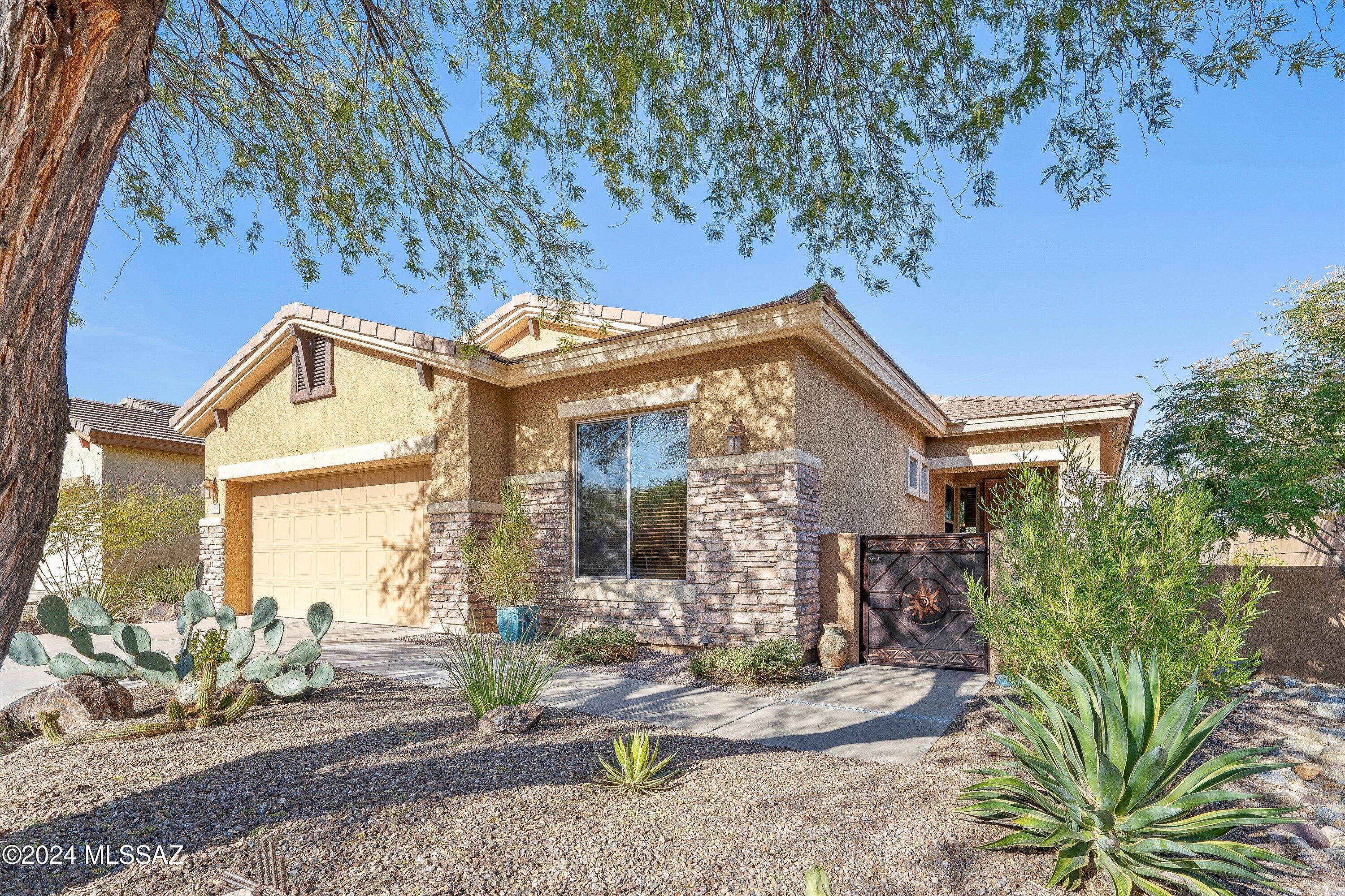 PICTURE PERFECT 4 BR 2 BATH W OFFICE/DEN, HOME HAS HAD OVER 70K OF IMPROVEMENTS TO NAME A FEW. MASTER BATH REMOLDED COMPLETED ON 2/2024 , NEW HVAC 19 SEER INSTALLED IN 9/2020, LR & MB PATIO DOORS, NEW MAIN WATER LINE STREET TO METER, 8 WINDOWS REPLACED WITH TRANSFERABLE WARRANTY THRU TUCSON WINDOW, NEWER LVT FLOORING IN LR,DR,DEN,KIT,HALL, FIREPIT IN REAR WITH NEW SEPERATE GAS LINE BENCHES AND PAVERS, NEWER APPLIANCES, NEWER 2 ZONED IRRIGATION LINES & BOX. OUTDOOR OASIS.- STEP OUSIDE TO AN INVITING BACKYARD ADORNED WITH BEAUTIFUL PLANTS & ENJOY THE FIREPIT. BACKS TO THE NEWLY FORMED PRESERVE VISTOSO.ENSURING NO FUTURE DEVELOPEMTS AND PROVIDING AN UNPARALLELED SENSE OF PRIVACY & NATURAL BEAUTY.
