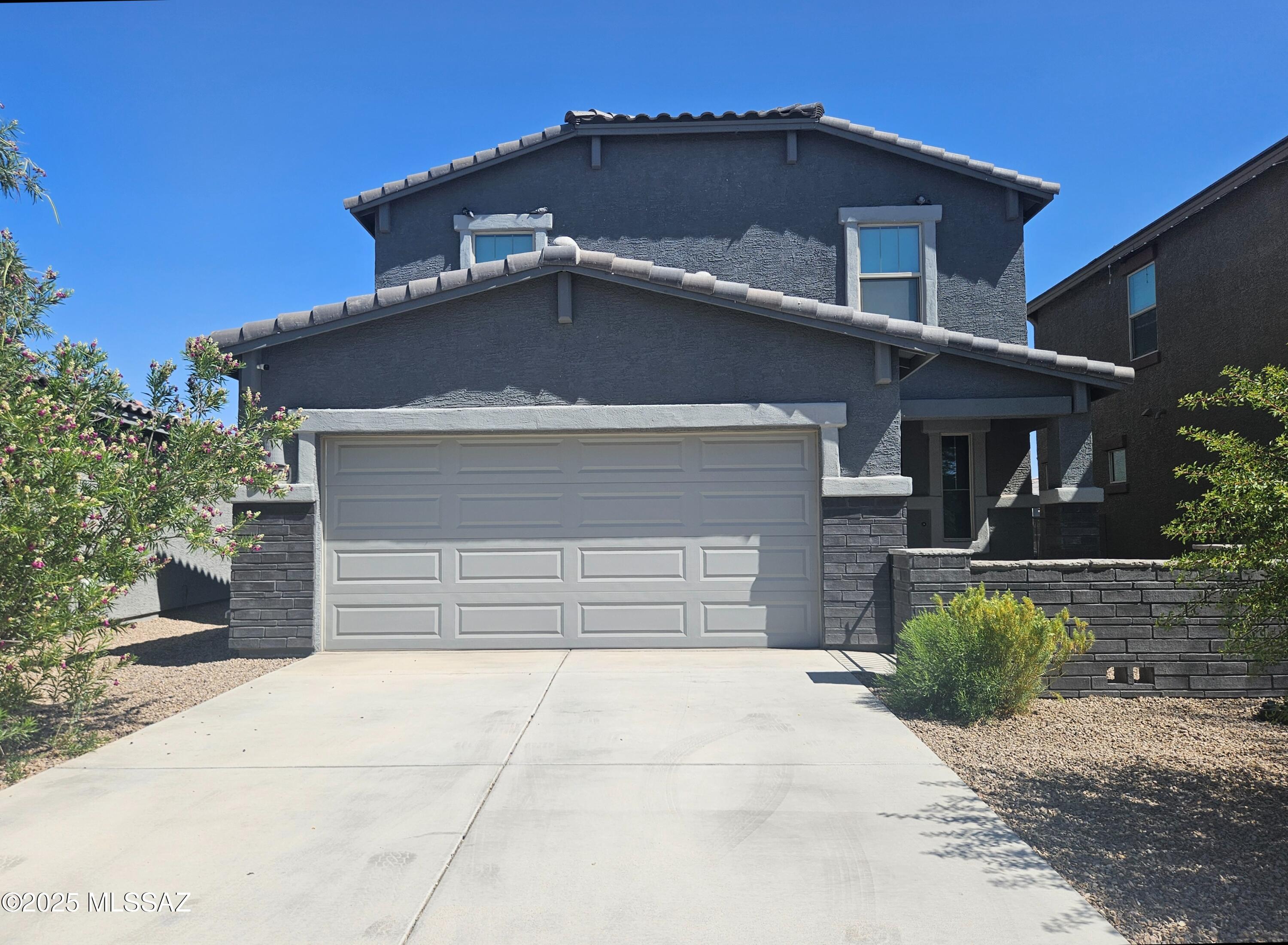This beautiful 2,220 sq. ft. home for Rent in the Gladden Farms Community is full of upgrades! Featuring 4 Bedrooms, 3 Bathrooms, abundant storage space, and a large upstairs loft perfect for an office, playroom, or second living room! The kitchen has granite countertops, tile backsplash, a walk-in pantry, and a large island. All kitchen appliances, washer, and dryer are included. The fully finished backyard is the real showstopper with pavers, artificial turf, a hot tub, and your very own putting green! Don't miss your chance to rent this stunning home in a fantastic neighborhood that's conveniently located near 1-10, shopping, and schools! Schedule your showing today! *Pets must be approved by the Landlord.*