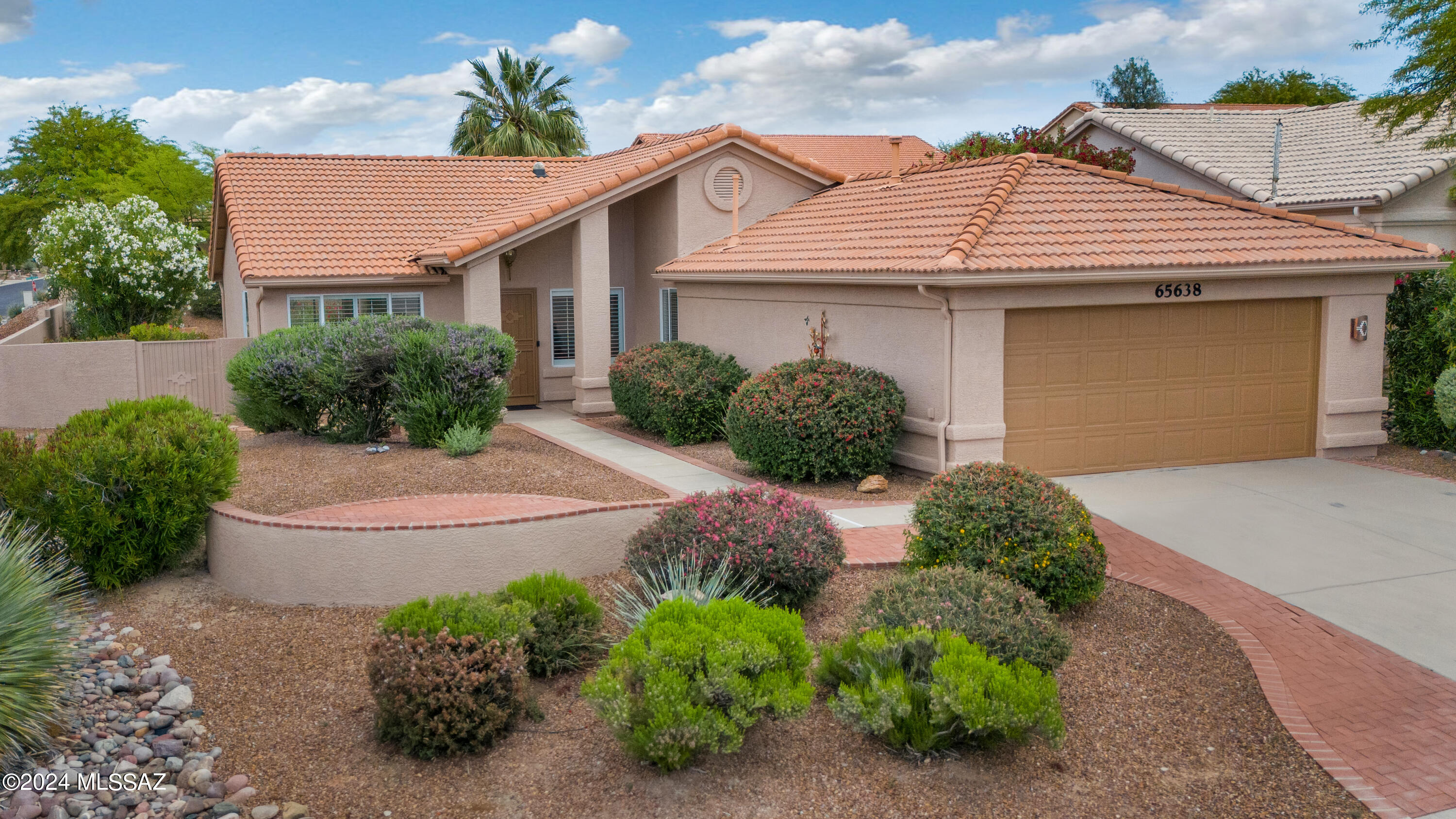 We're Proud to Present a Diego located on Corner Lot & Mountain Views from Backyard. Front yard Courtyard & Gated Yard. Freshly Painted Exterior 5/2024. Custom Wrought Iron Door as you enter. Living Room with Archway to Kitchen for more natural light. Den/Office has Office System & Cabinets. Family Room has Slider to Patio. Kitchen has Stainless Steel Appliances, Abundance of Cabinets with Pull-outs & Kitchen Dining Area. Owner's Suite has Slider to Patio. Owner's Bathroom with Walk-in Shower & 2 Closets. Guest Bedroom with Walk-In Closet has Guest Bathroom near by with Solar Tube. Laundry Room has W/D, Storage & Craft Area. Plantation Shutters & no carpet. 2017 W/H & HVAC. 2 Car Garage has Utility Sink & Storage. Covered Paver Patio with extended Paver Patio to enjoy Mountain Views.