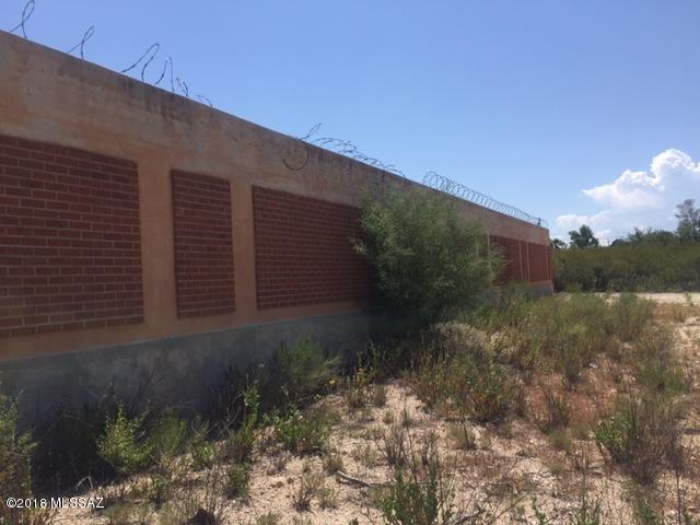 Perfect location for many uses. Lot is .76 acres and is surrounded by a block wall. Property used to belong to TEP. Great frontage, great location with easy access.
