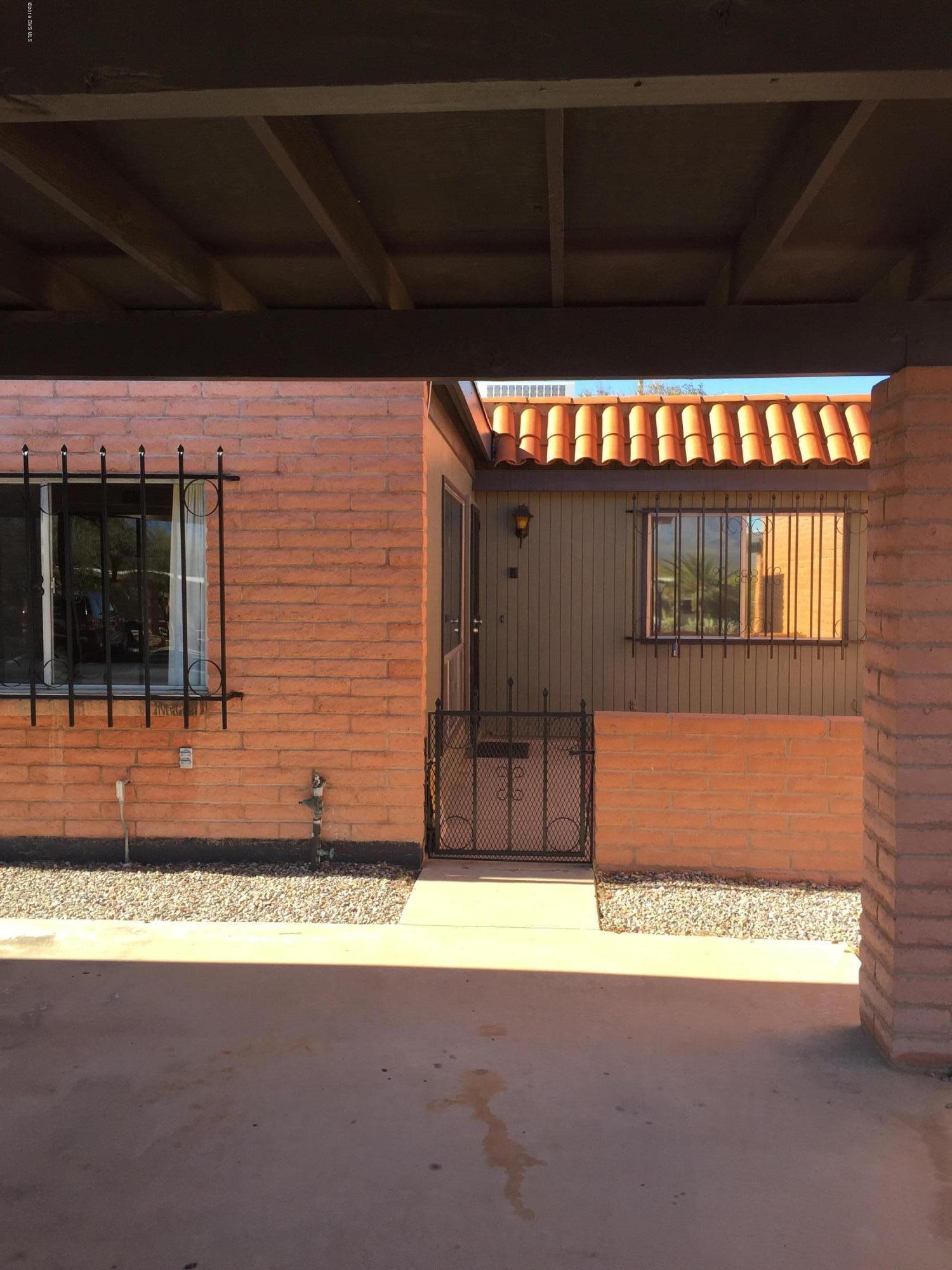 2 minute walk (directly across the street) to neighborhood Recreation center with BEAUTIFUL sparkling pool and spa!!! GREAT central GV location close to restaurants, shopping, medical and worship. Two bedroom, two bath unit with front and backyard patios. Front yard looks directly at the Santa Rita mountain range. Priced to sell!!! Don't miss this one!!!