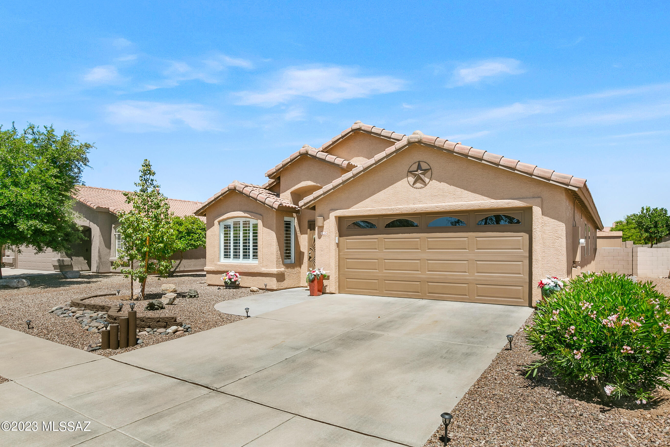 Range Priced-Seller will accept/counter offers b/w $400,000 $ $425,000. Welcome Home to this Updated & Magazine Worthy Beauty in a Great Location! The Gorgeous Kitchen offers New Granite Counters, Large Walk-In Pantry, New Slate SS appliances, Updated Cabinets & New Subway Tile Backsplash. Both Bathrooms have New Executive Height Vanities & Newly Resurfaced Showers. The Expansive Great Room has French Doors leading to the Covered Patio & Easy-Care Back Yard; with a Shed, Artificial Turf & Pavers. New A/C installed in 2022; New Flooring & Plantation Shutters Through-Out; PLUS, a Newer Water Softener with R/O system & Central Vacuum System. Spacious Tandem Garage with Epoxy Floors & New Garage Door (room for large vehicle). Interior & Exterior of Home recently painted. Visit & Fall-In-Love! This beautiful home is located in the Sought-After Neighborhood of Continental Ranch.
This master-planned community located in the heart of Marana at the foothills of the Tucson Mountains has everything you need in a neighborhood. There is a vast assortment of recreational opportunities including two pool facilities, splash pad, kiddie pool, baseball field, parks, soccer field & community center. Continental Ranch is truly a place to call home.